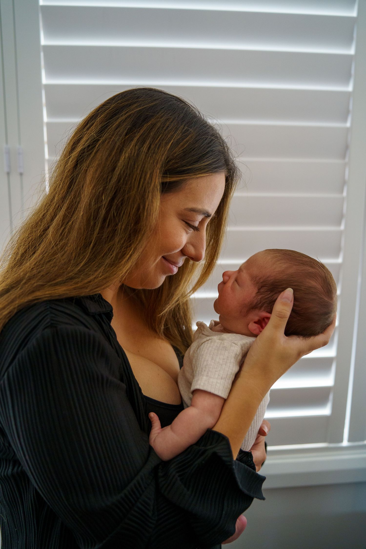 Emotive maternity photography celebrating motherhood and connection in Western Sydney