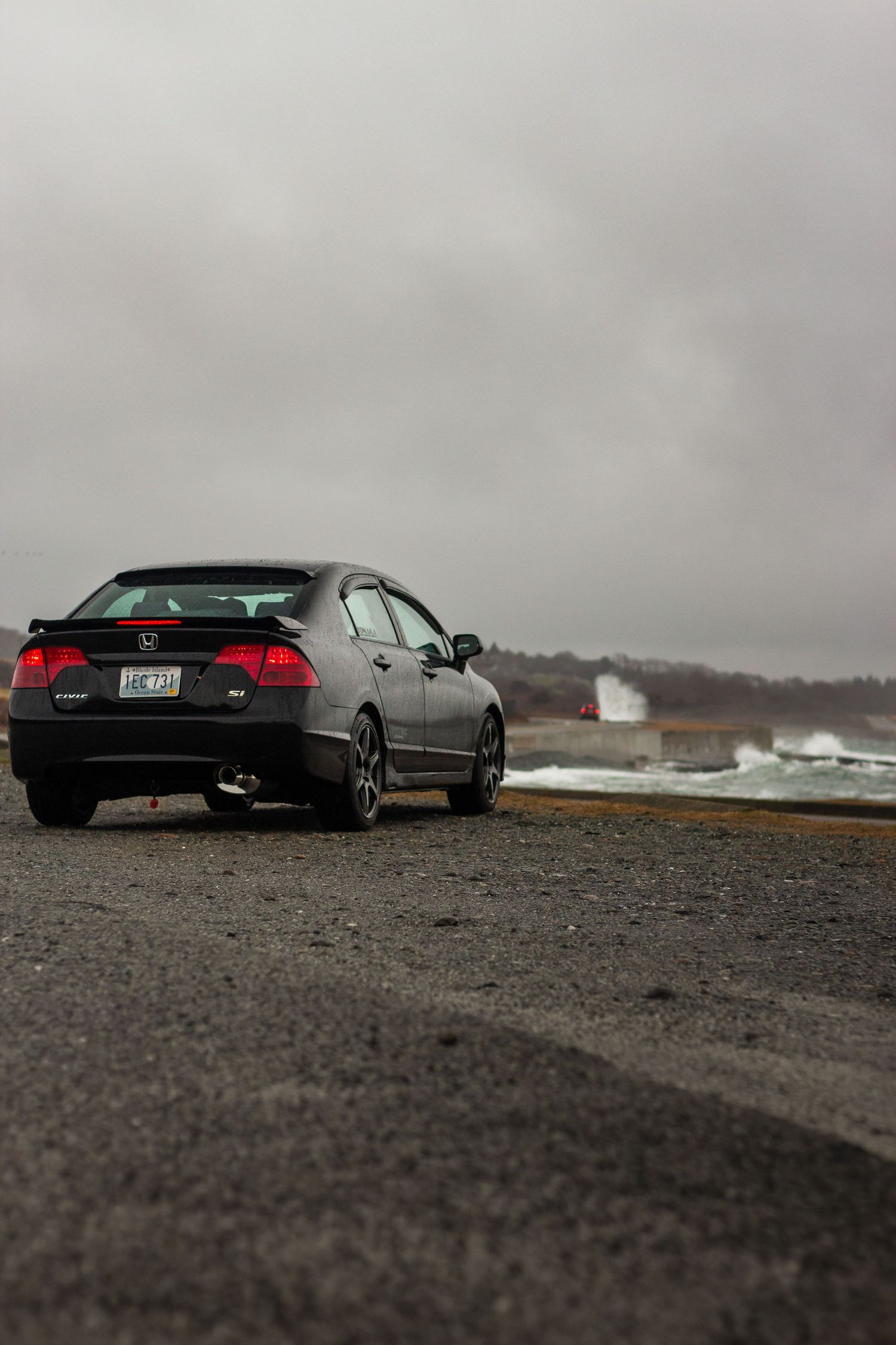 Black 2010 Honda civic SI Stormy day