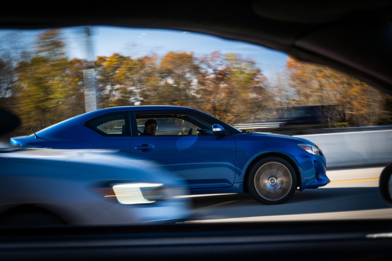 Friends cruising together on the Highway, Scion tc and Subaru WRX
