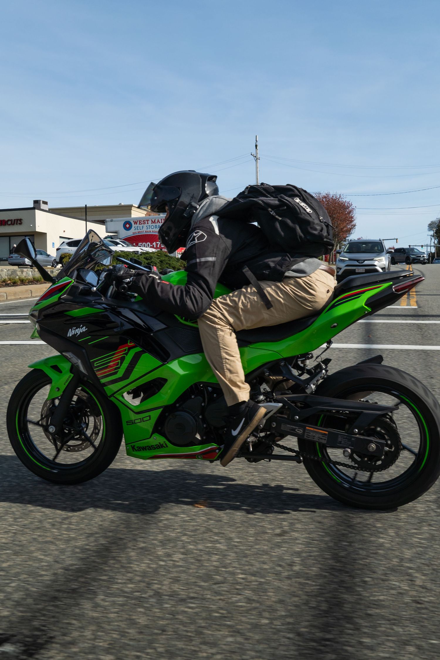 Green Kawasaki Ninja 500 cruising funny