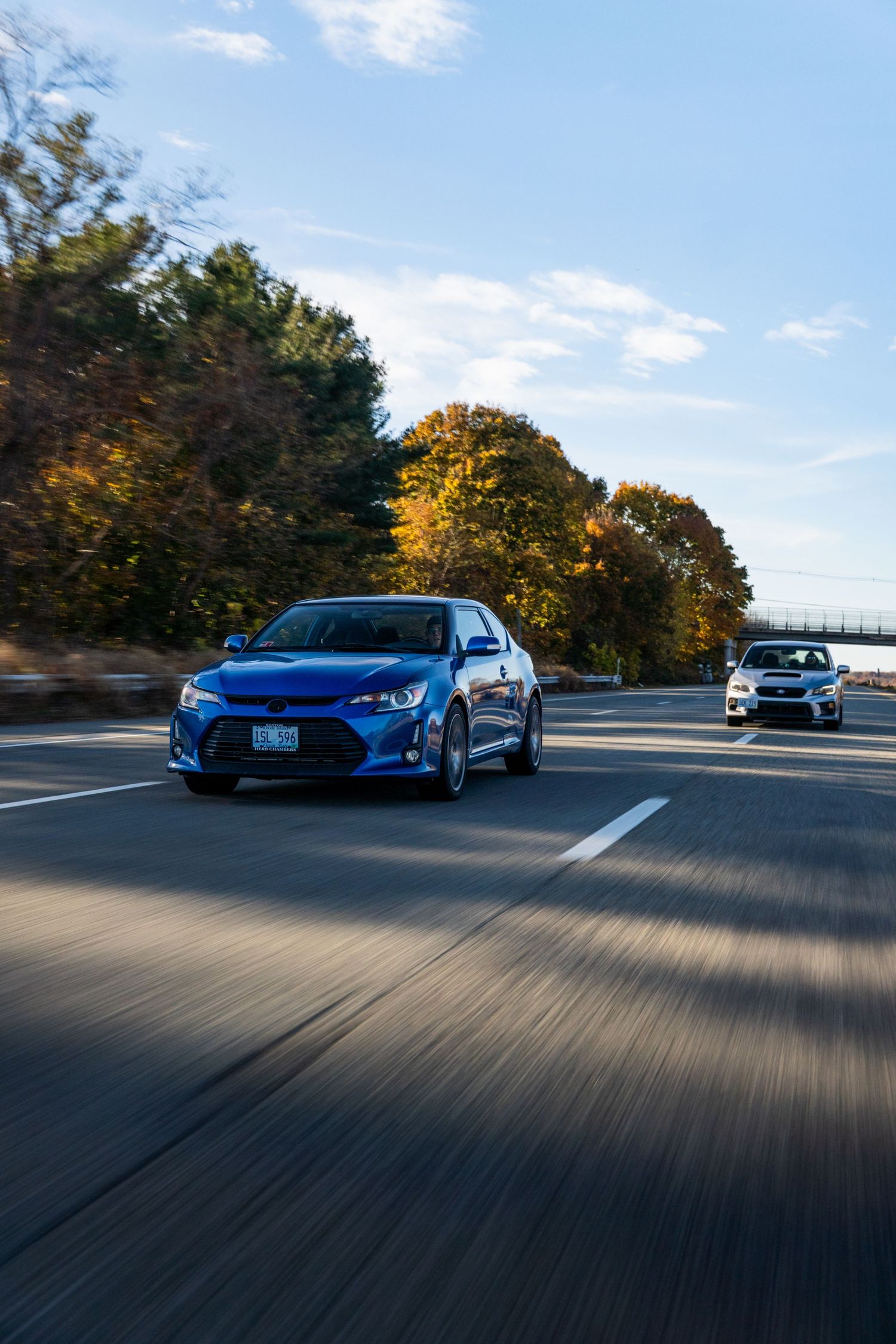 Friends cruising together on the Highway, Scion tc and Subaru WRX