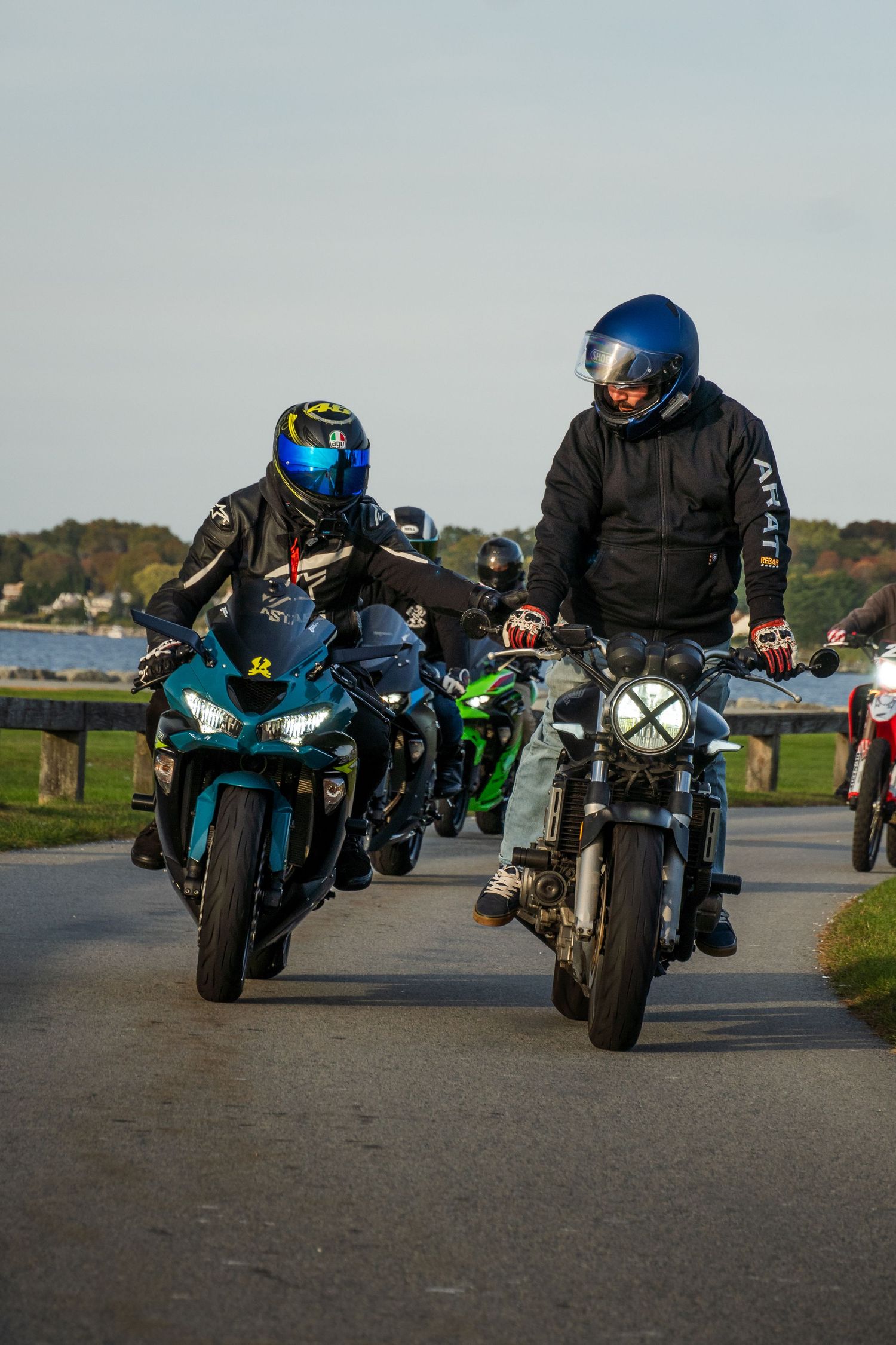 Friends Cruising on motorcycles at the beach