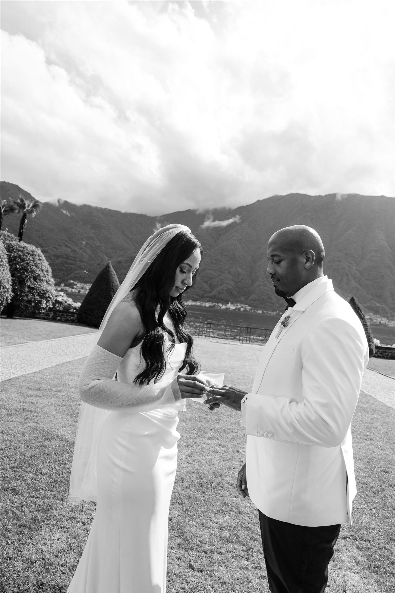 Wedding couple shares candid moments of joy during their outdoor photo session.