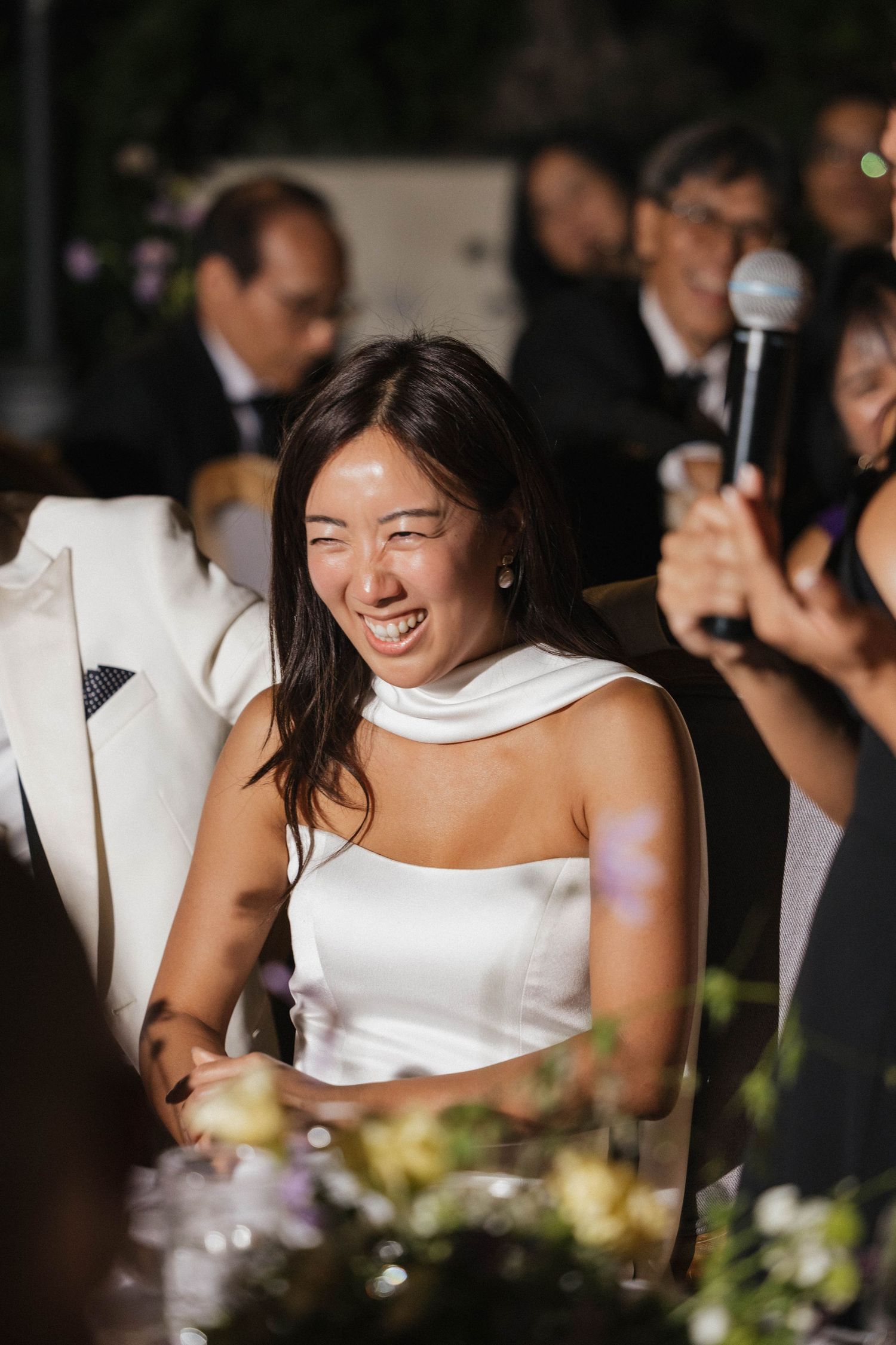 Wedding reception candid shots showing joyful moments during celebrations.