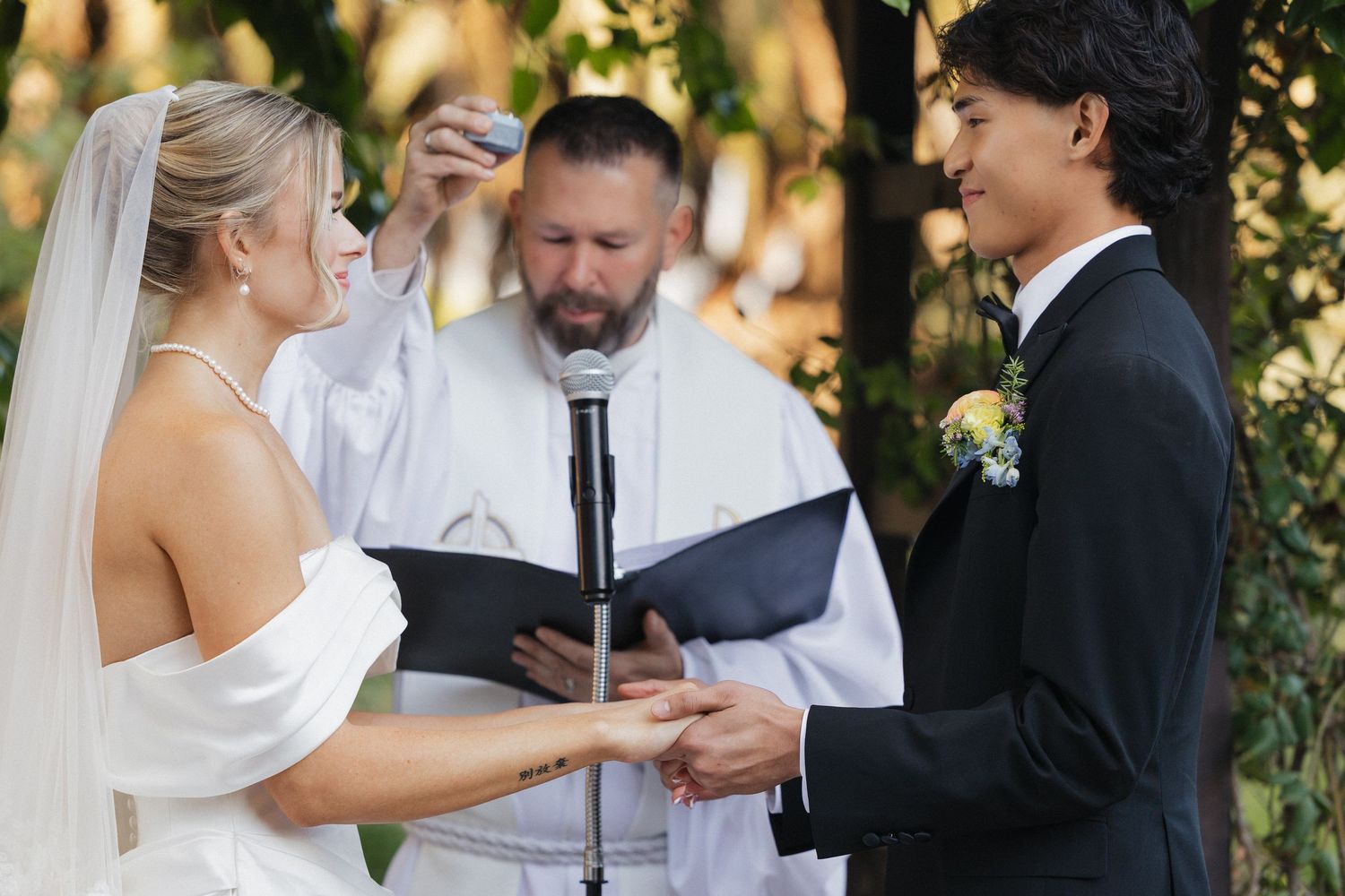 Intimate wedding ceremony moments captured in golden hour lighting.