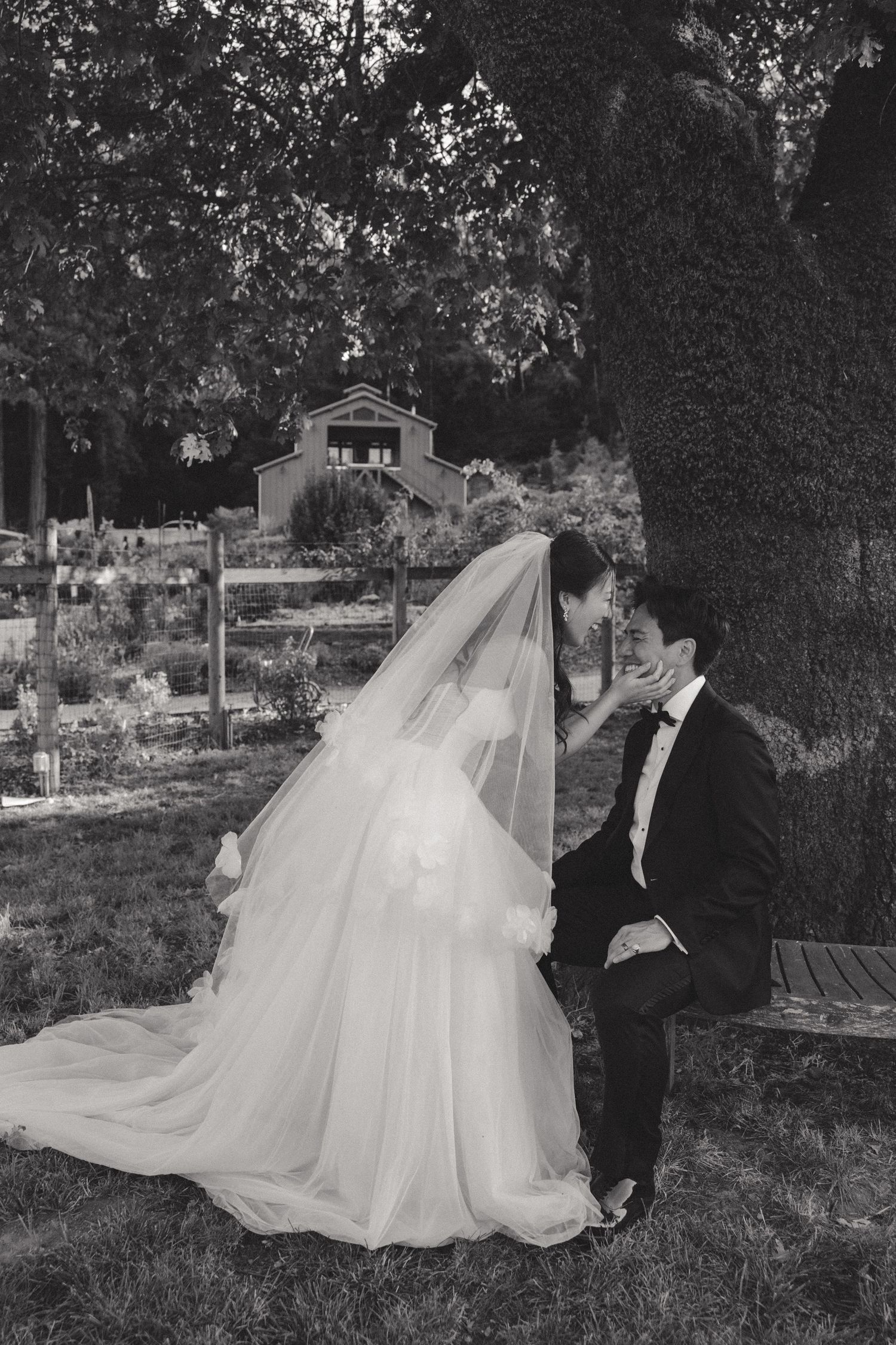 Black and white wedding photography sequence showing a couple in an outdoor garden setting.