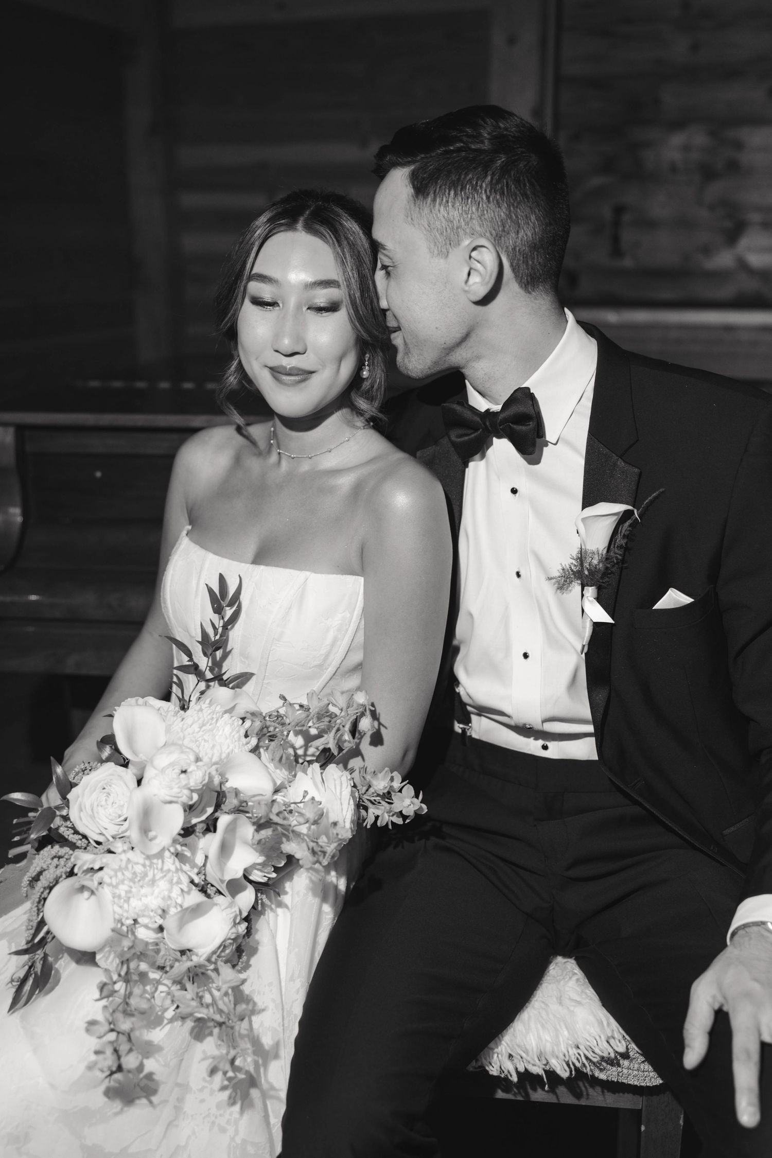 Elegant black and white wedding portraits featuring a bouquet and formal attire.