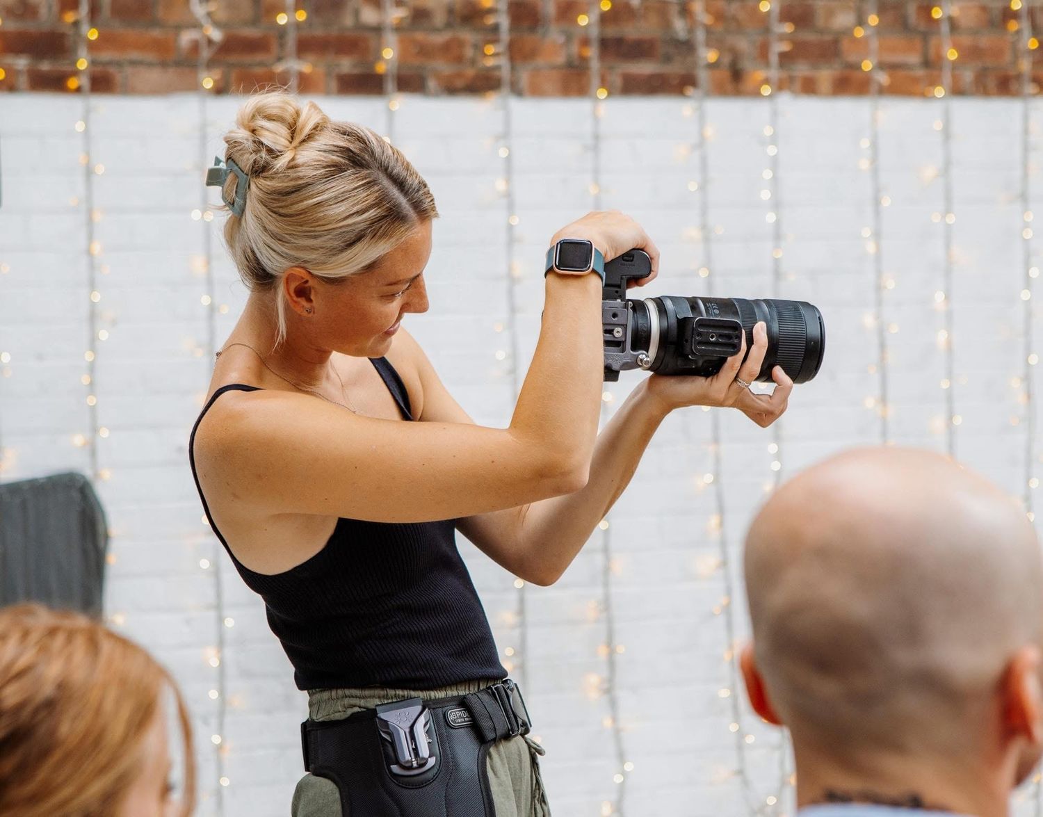 Professional photographer - LDH Photography, behind the scenes shot of a wedding day.