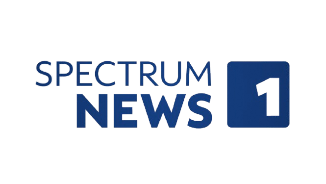 The blue-colored Spectrum News 1 logo on a black background.