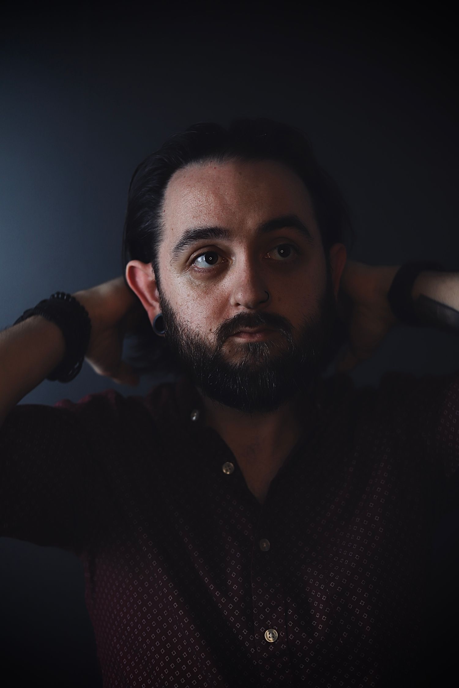 Dramatic low-key portrait sequence with moody lighting.