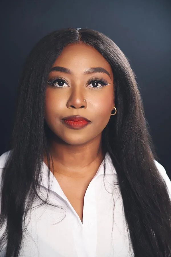 Professional beauty shots showcasing glamorous makeup and long dark hair against studio background.
