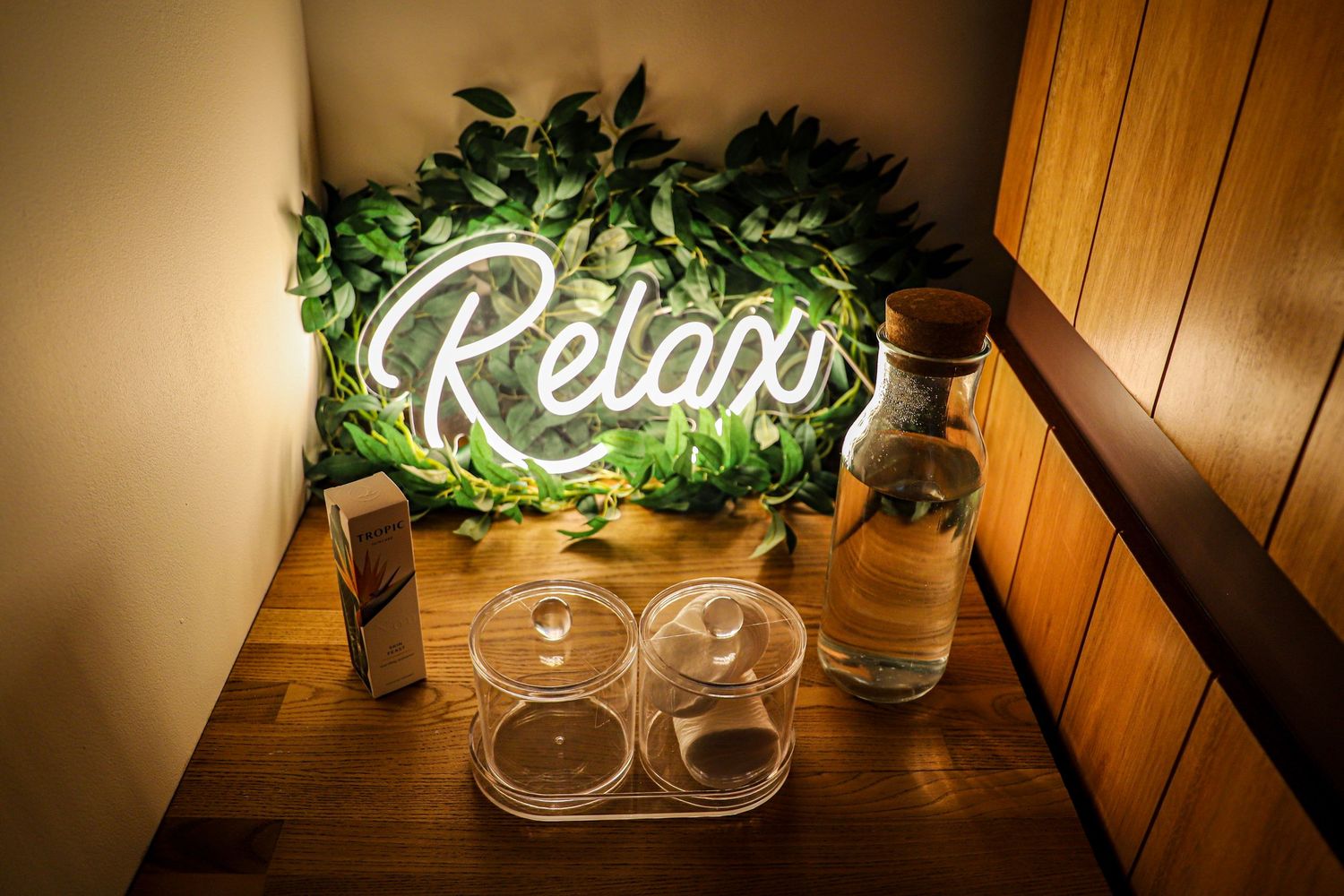 A 'Relax' sign set up in a restful space within a spa.