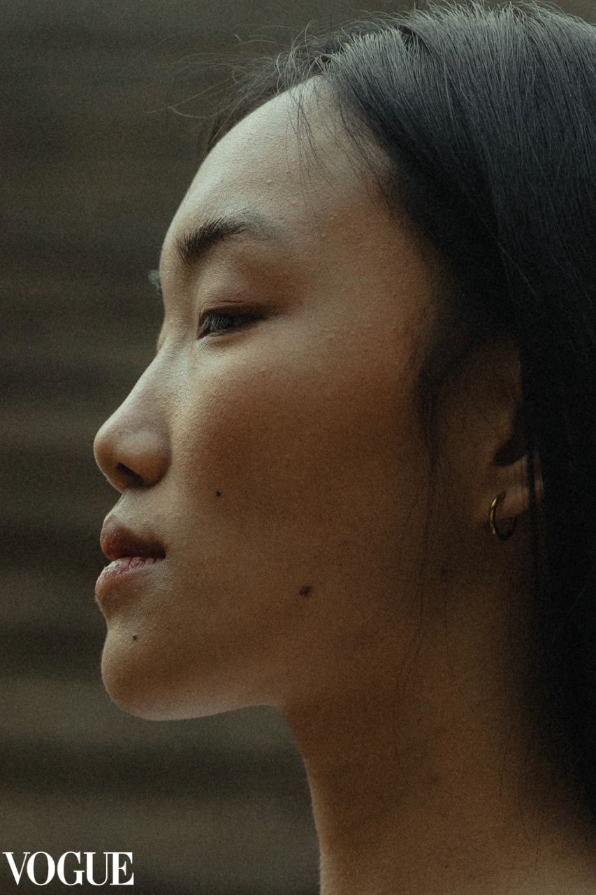 Cinematic profile shots with Vogue branding in warm tones.