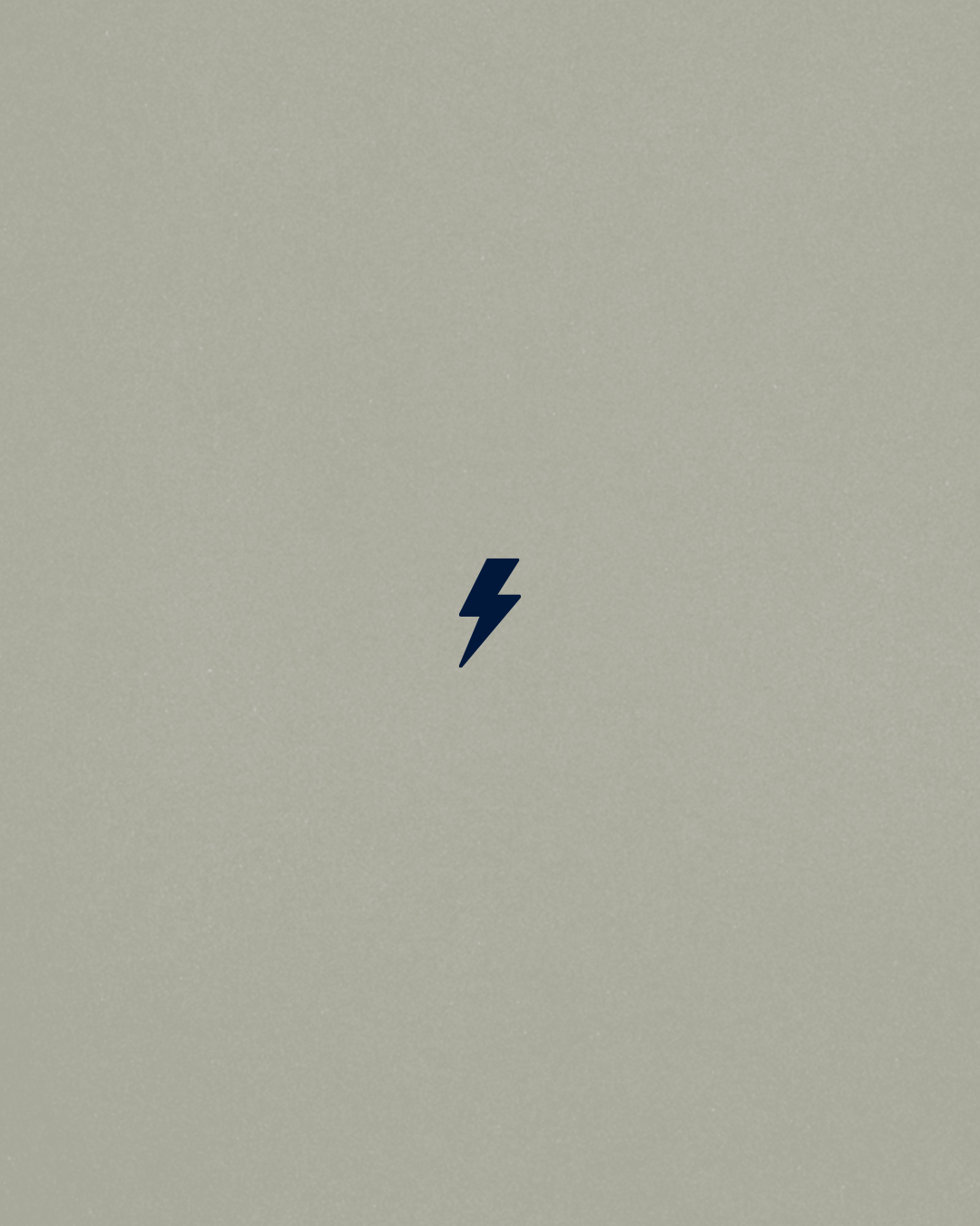 Simple gray background with small lightning bolt symbol in dark color.