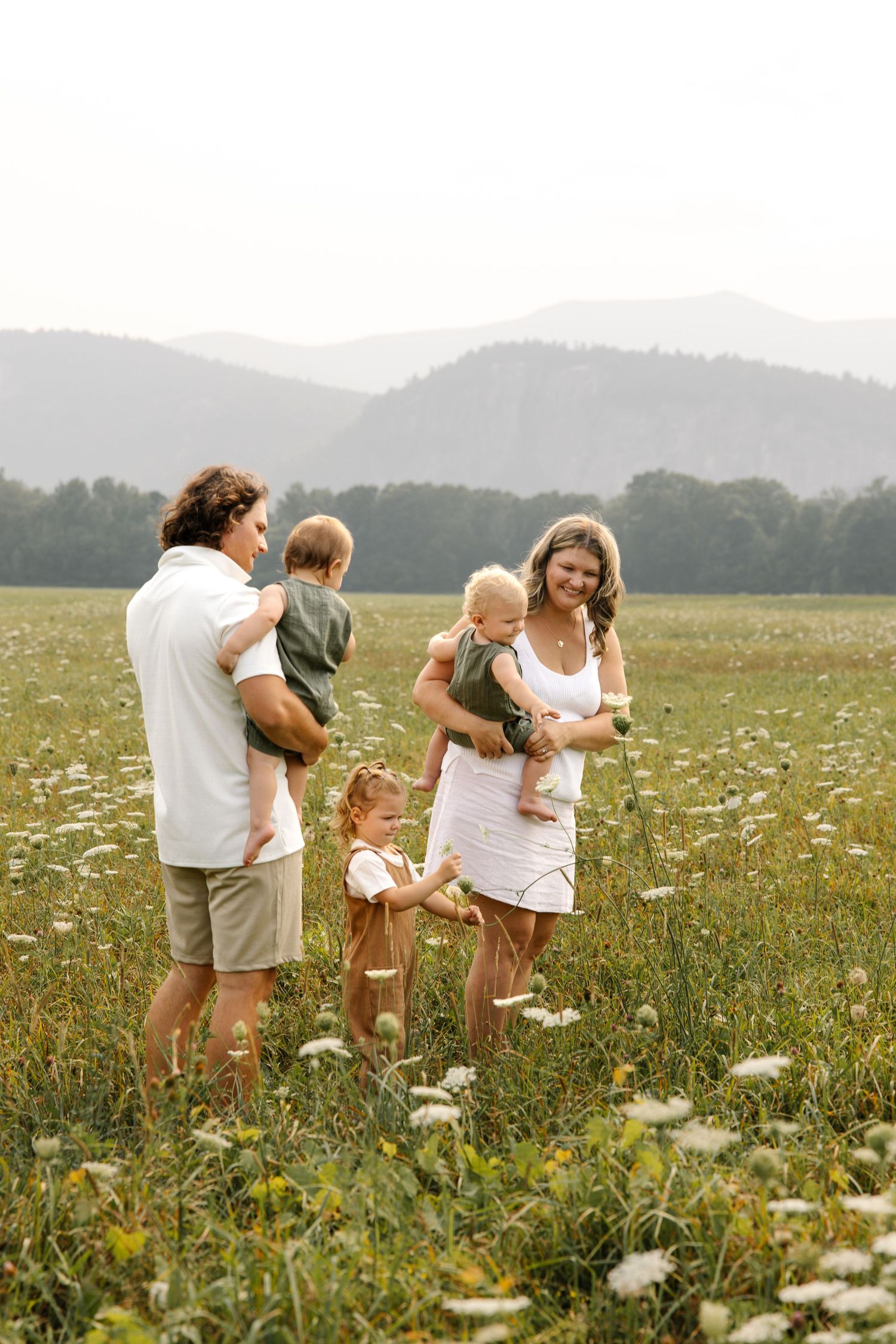 Family photos in the flower fields of New Hampshire mid summer.