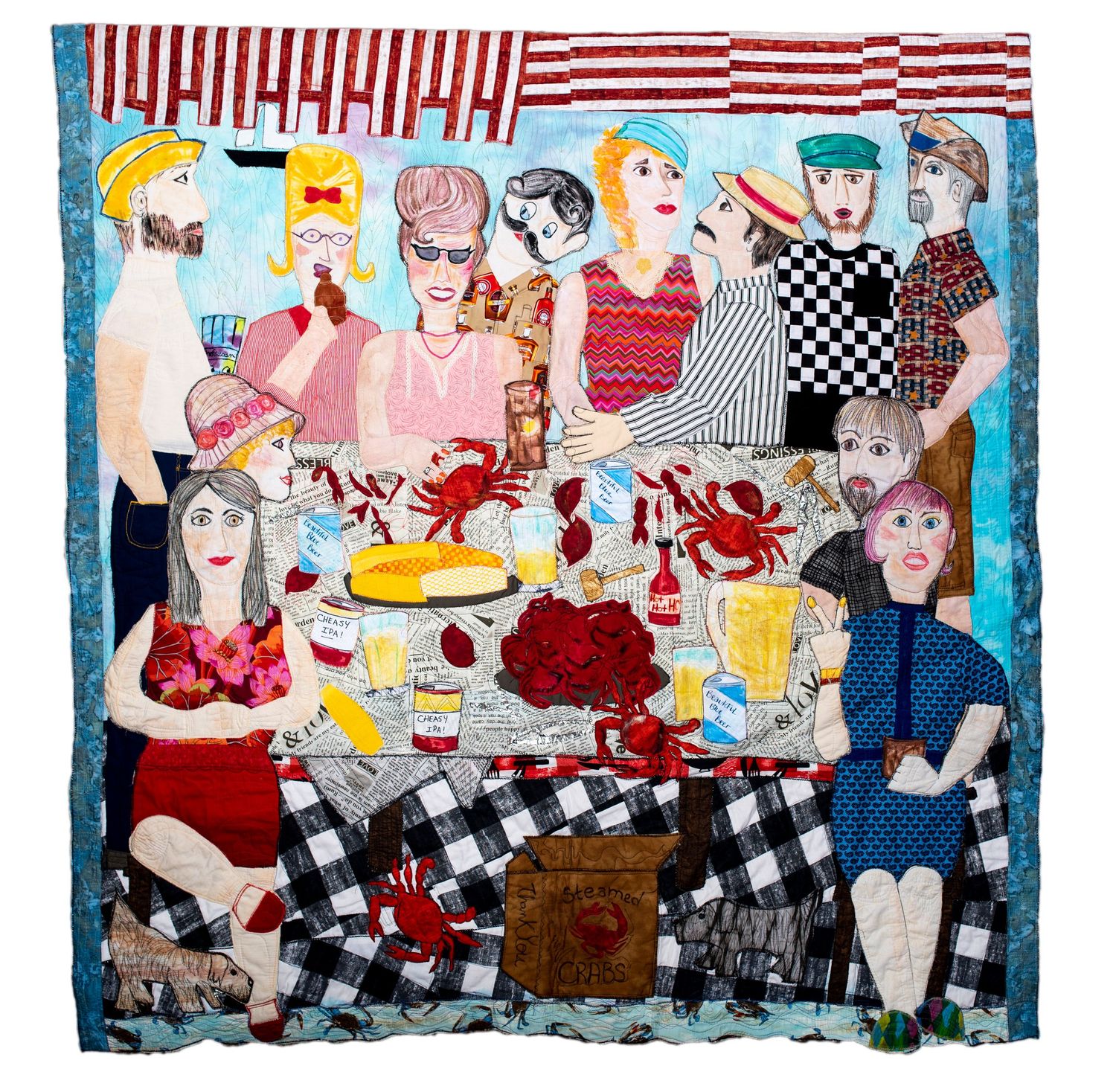 A colorful folk art style quilt depicting people at a seafood feast with crabs and checkered patterns.