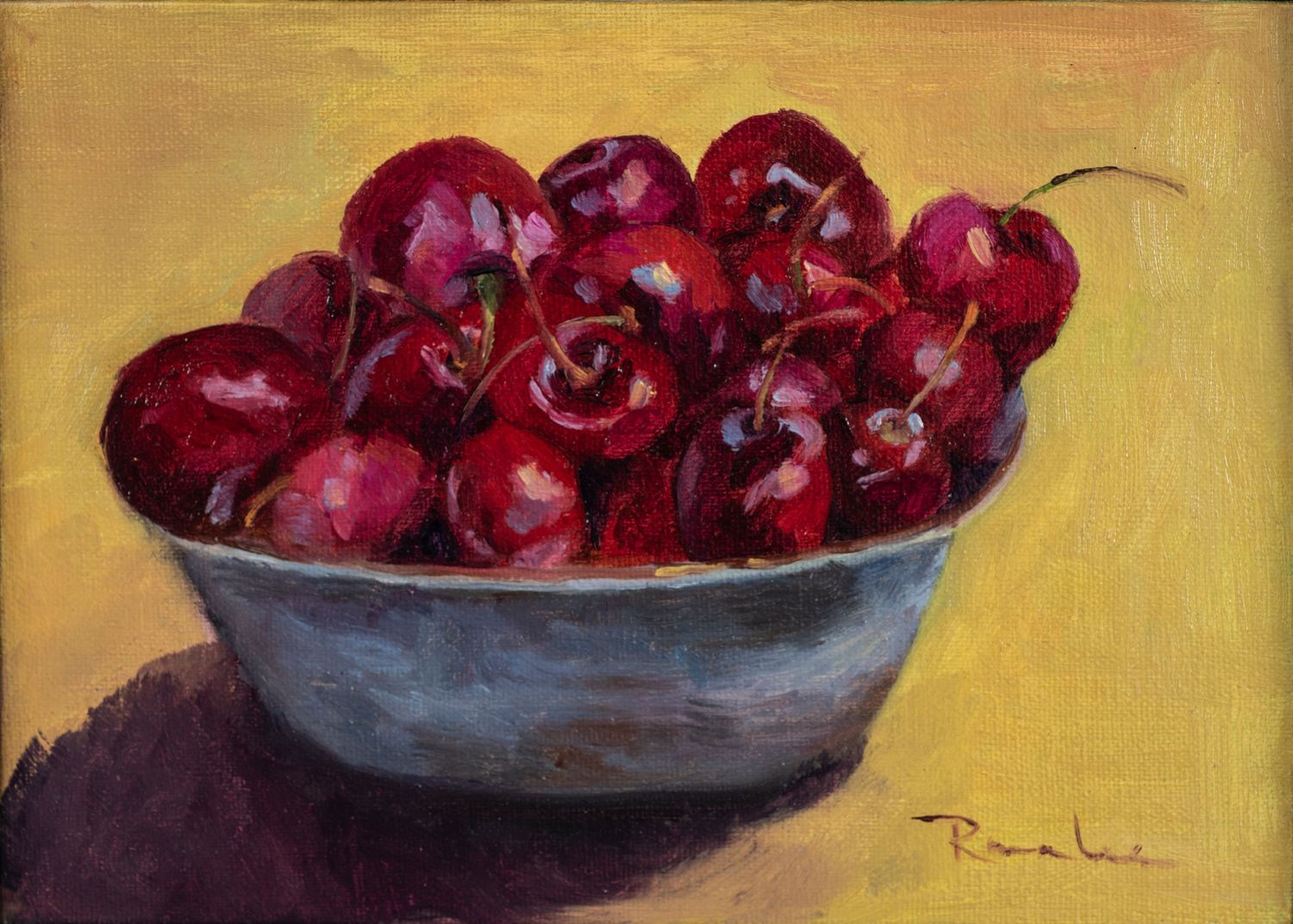 Oil painting of red cherries piled in a silver bowl on a yellow background, signed by the artist.