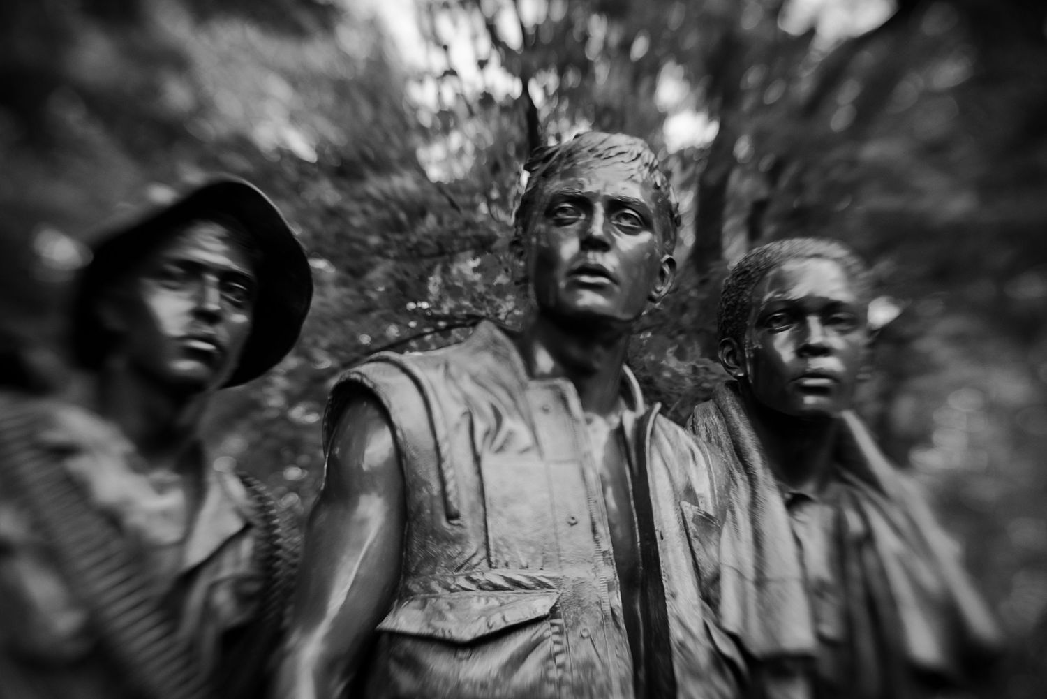 Black and white photo of the Three Soldiers Vietnam Veterans Memorial bronze statues in Washington DC.