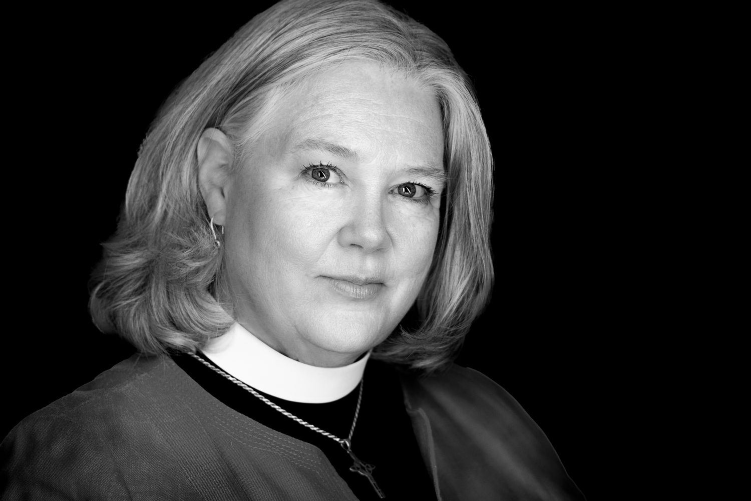 Black and white portrait with dramatic side lighting