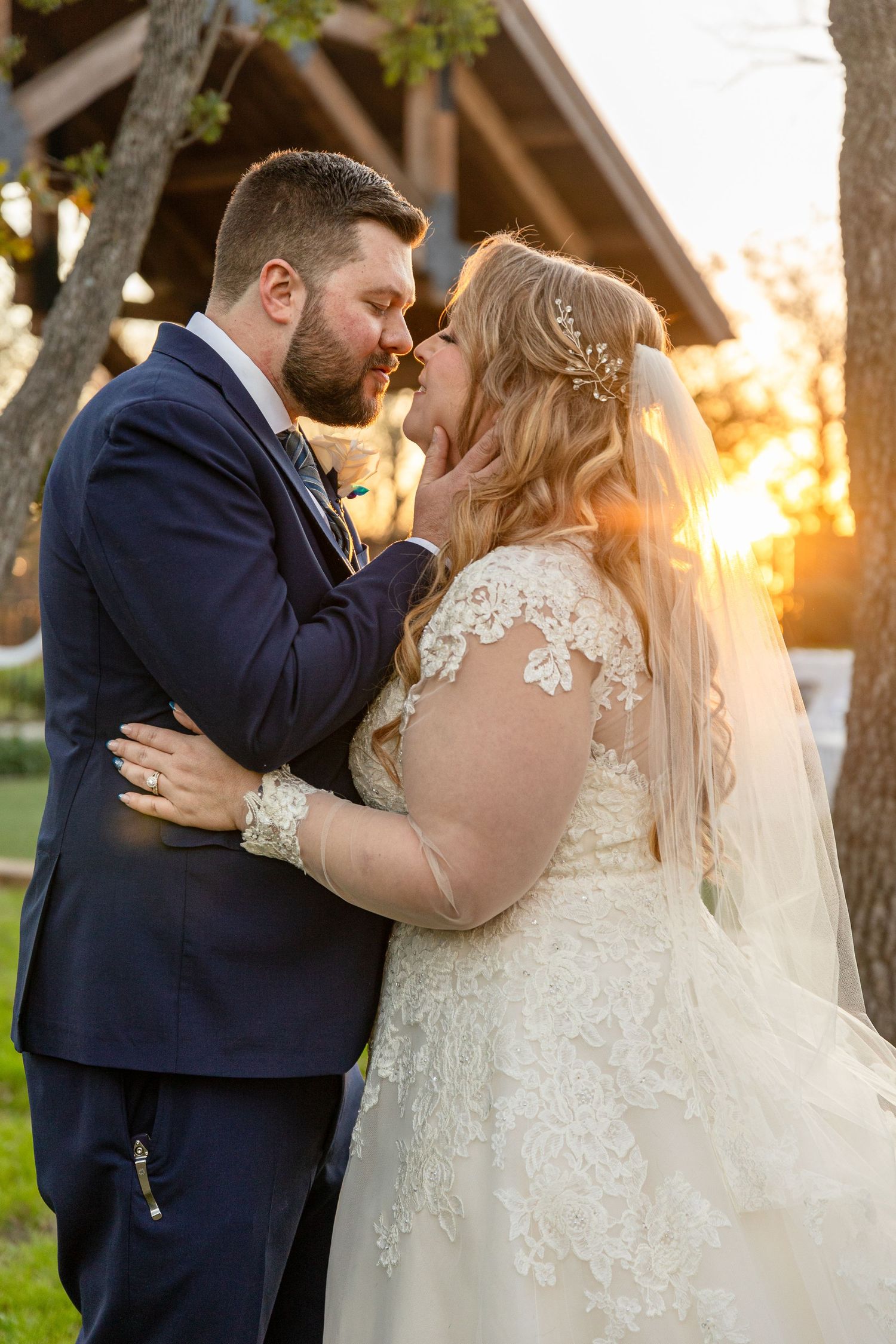 A series of intimate wedding kisses captured at golden hour under trees.