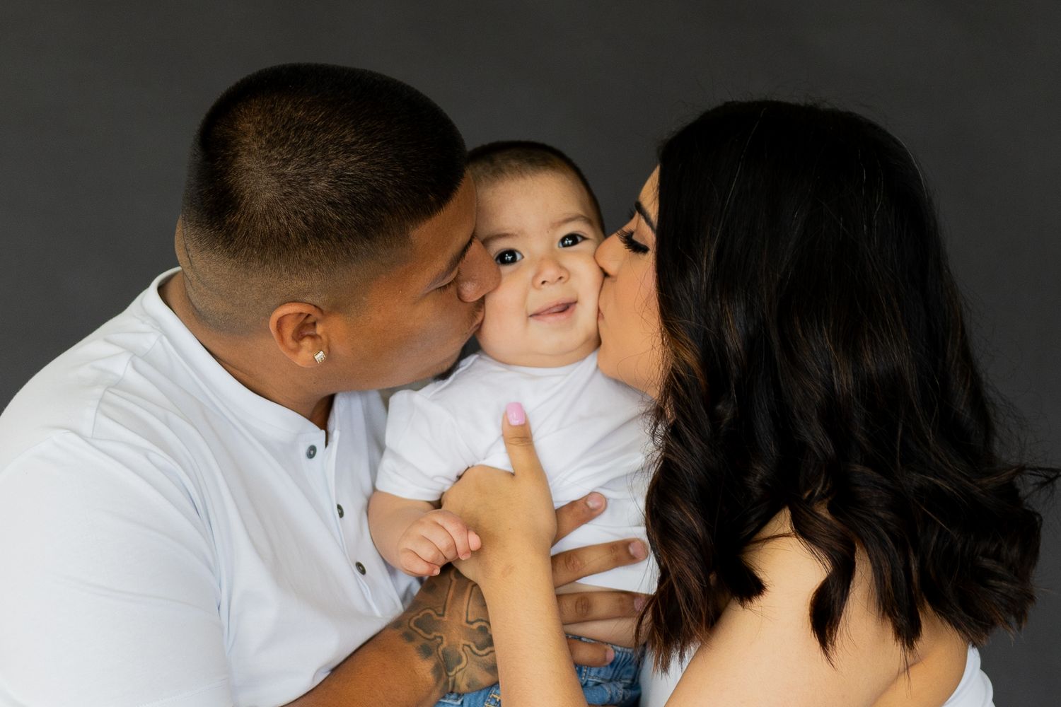 Series of intimate family moments captured against dark background.