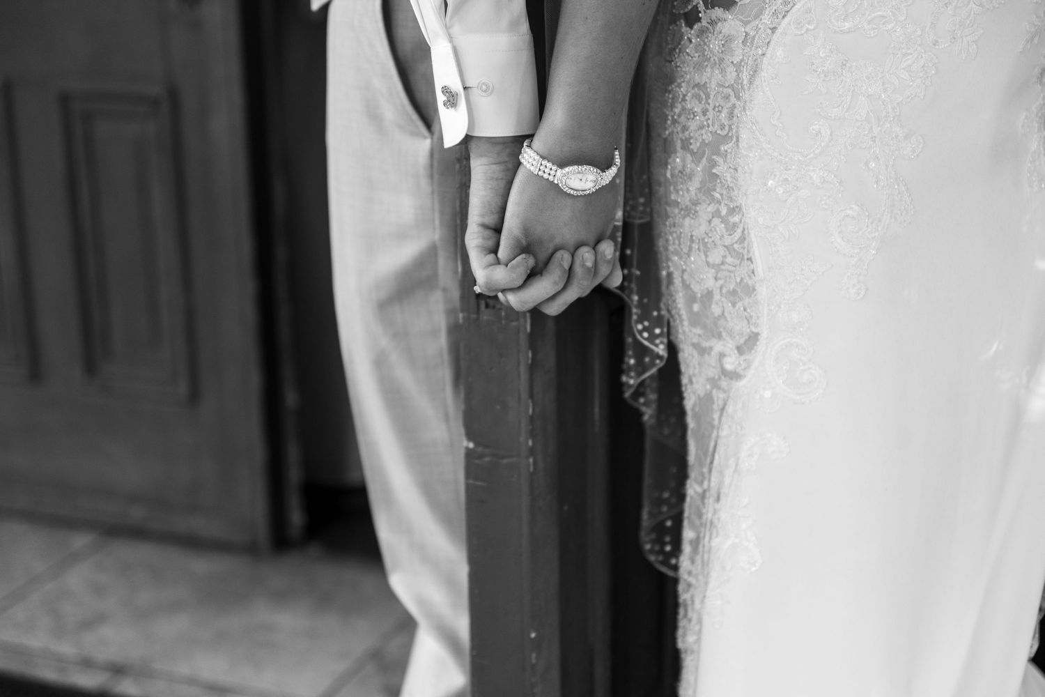 Black and white detail shots highlighting the bride's wedding dress and accessories.