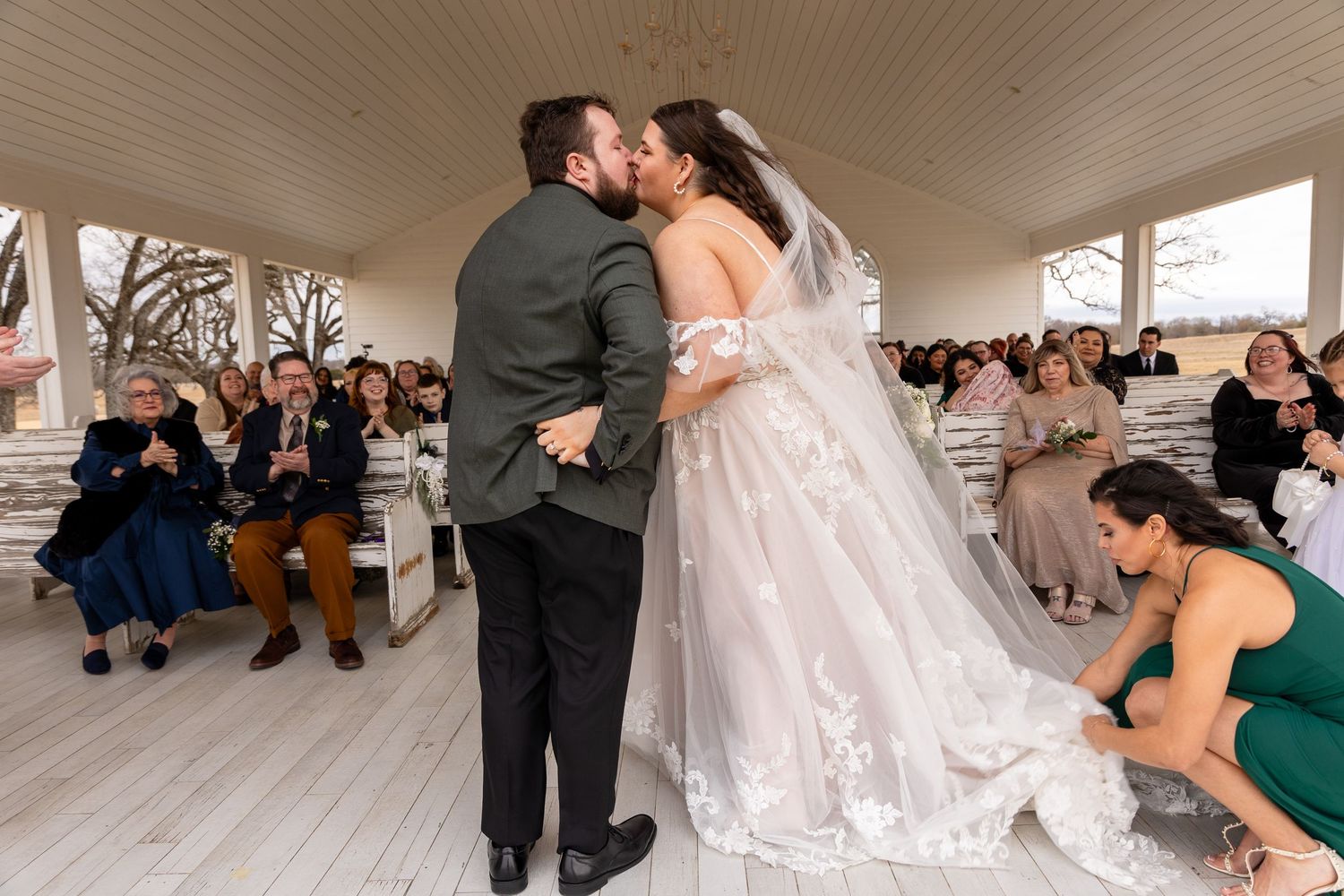 Wedding ceremony moments captured in a bright white chapel setting.