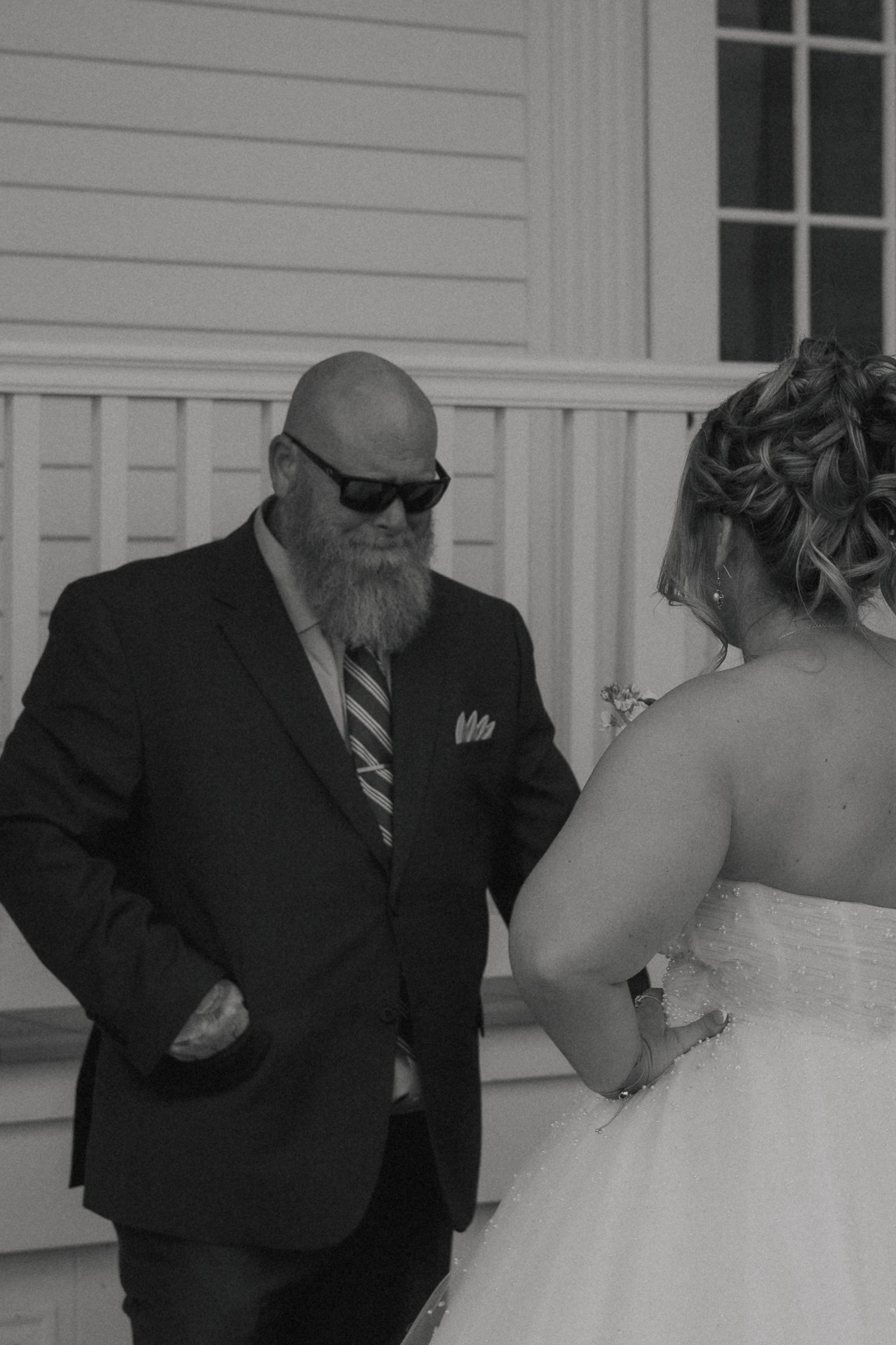 Brides first look with her dad on her wedding day. first look alternative photographed by a virginia wedding photographer in Gloucster, VA.