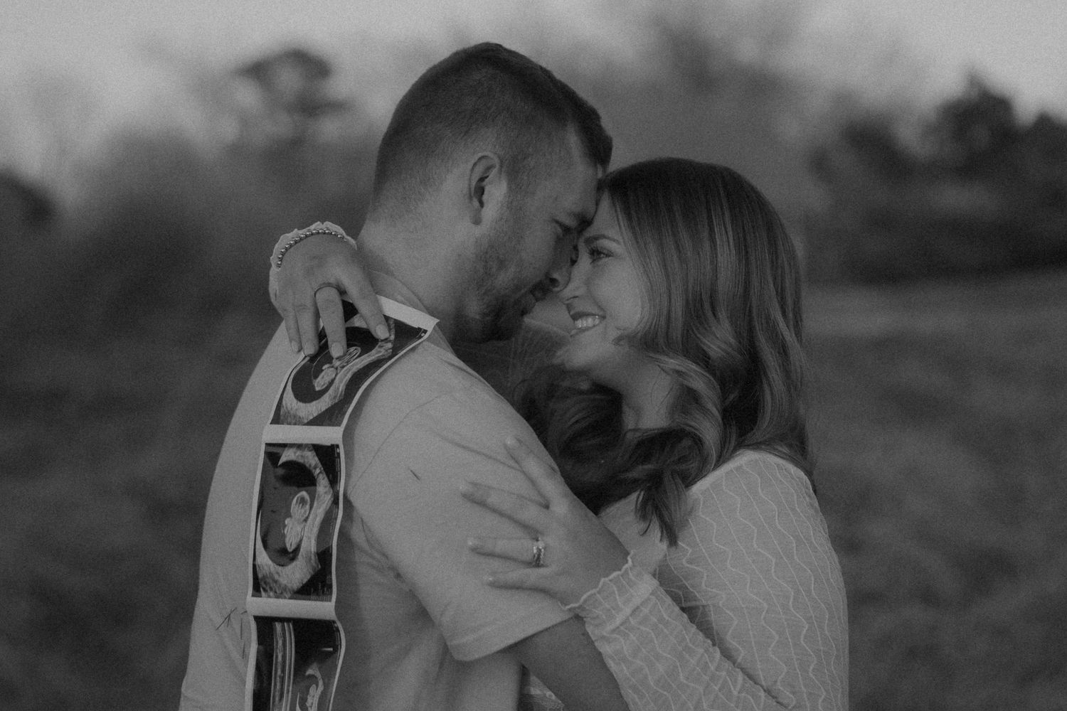 black and white spring engagement photoshoot with ultrasound photos at machicomcoo state park shot by virginia couples photographer
