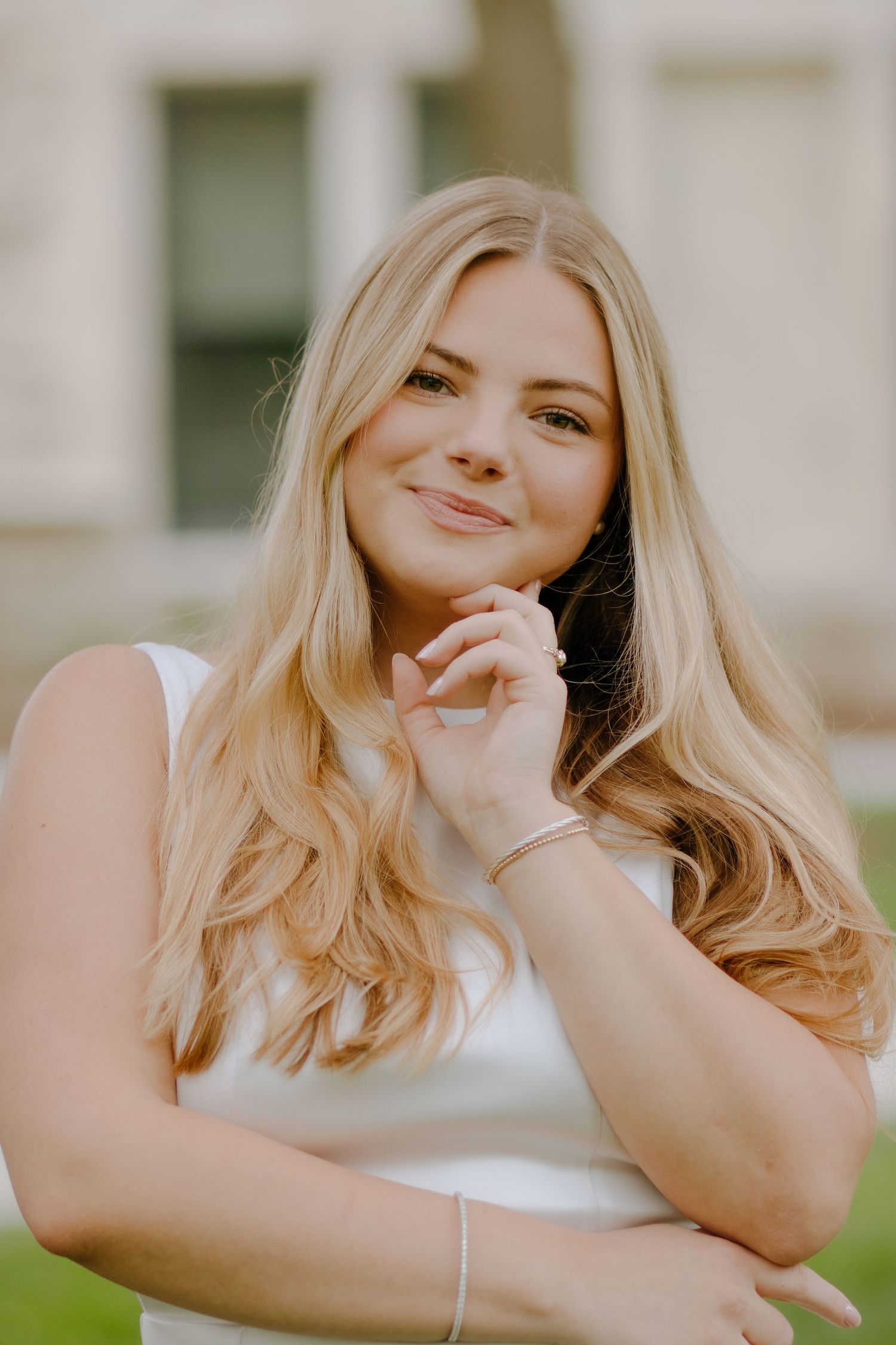 Portrait series showing joyful expressions against a light background.