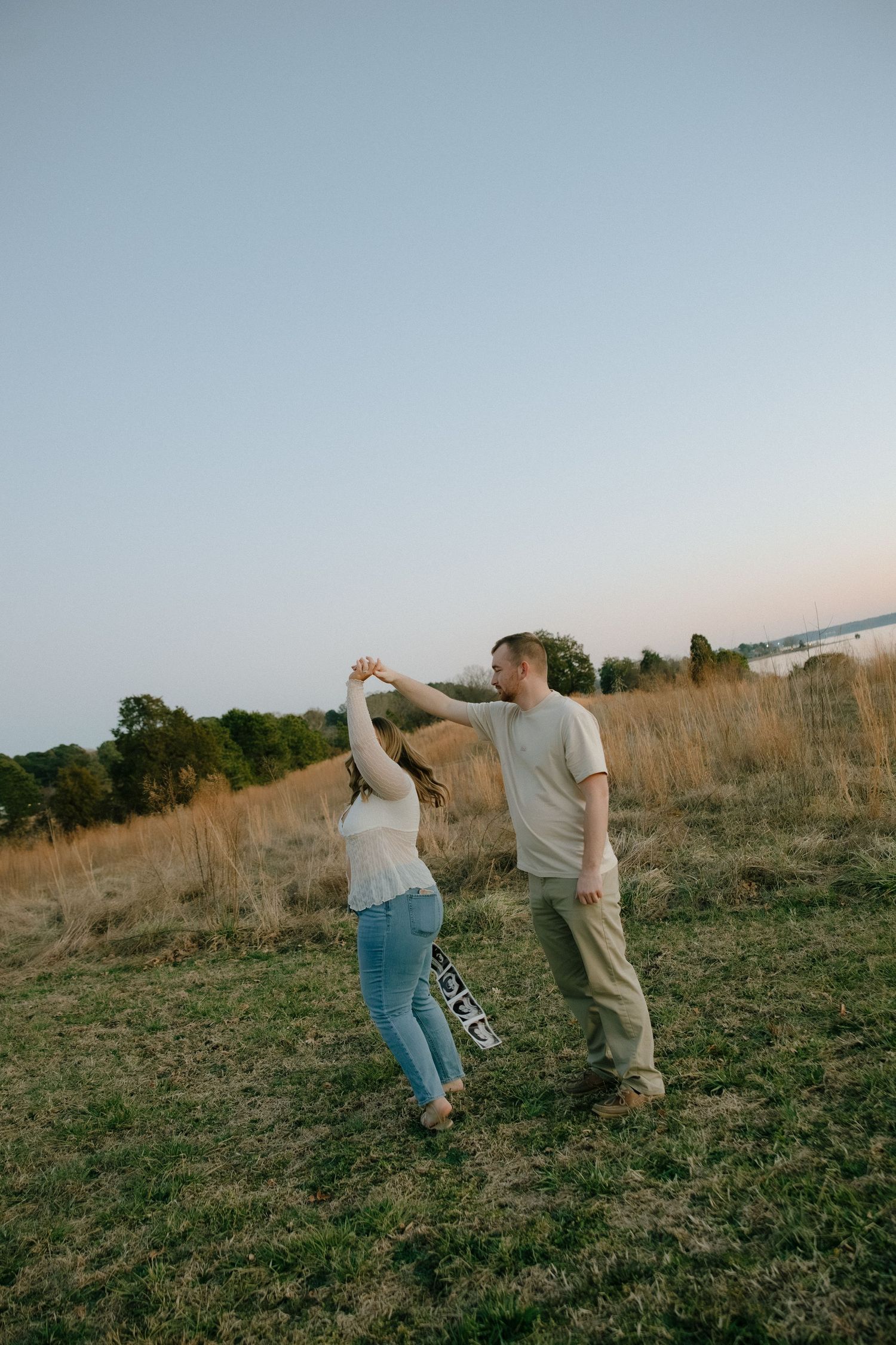 spring engagement photoshoot with ultrasound photos at machicomcoo state park in gloucester, va shot by virginia couples photographer