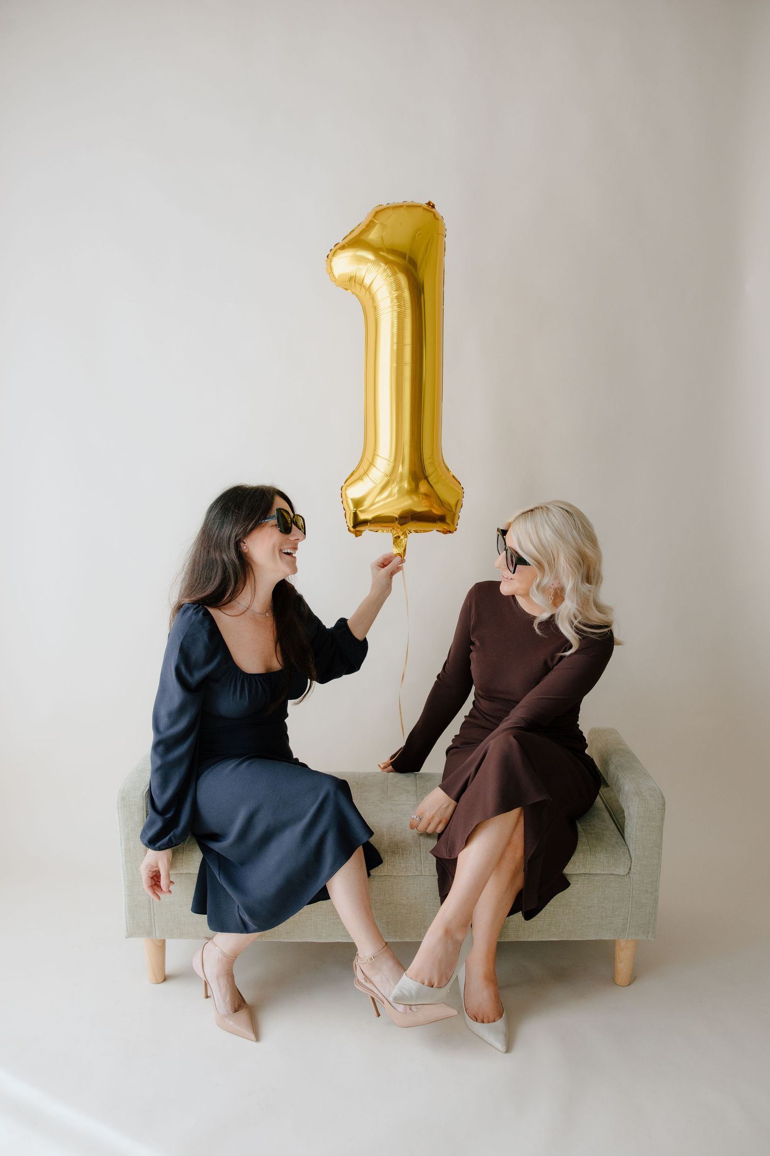 1 year anniversary branding photoshoot inspo with golden balloon in a studio shot by virginia branding photographer