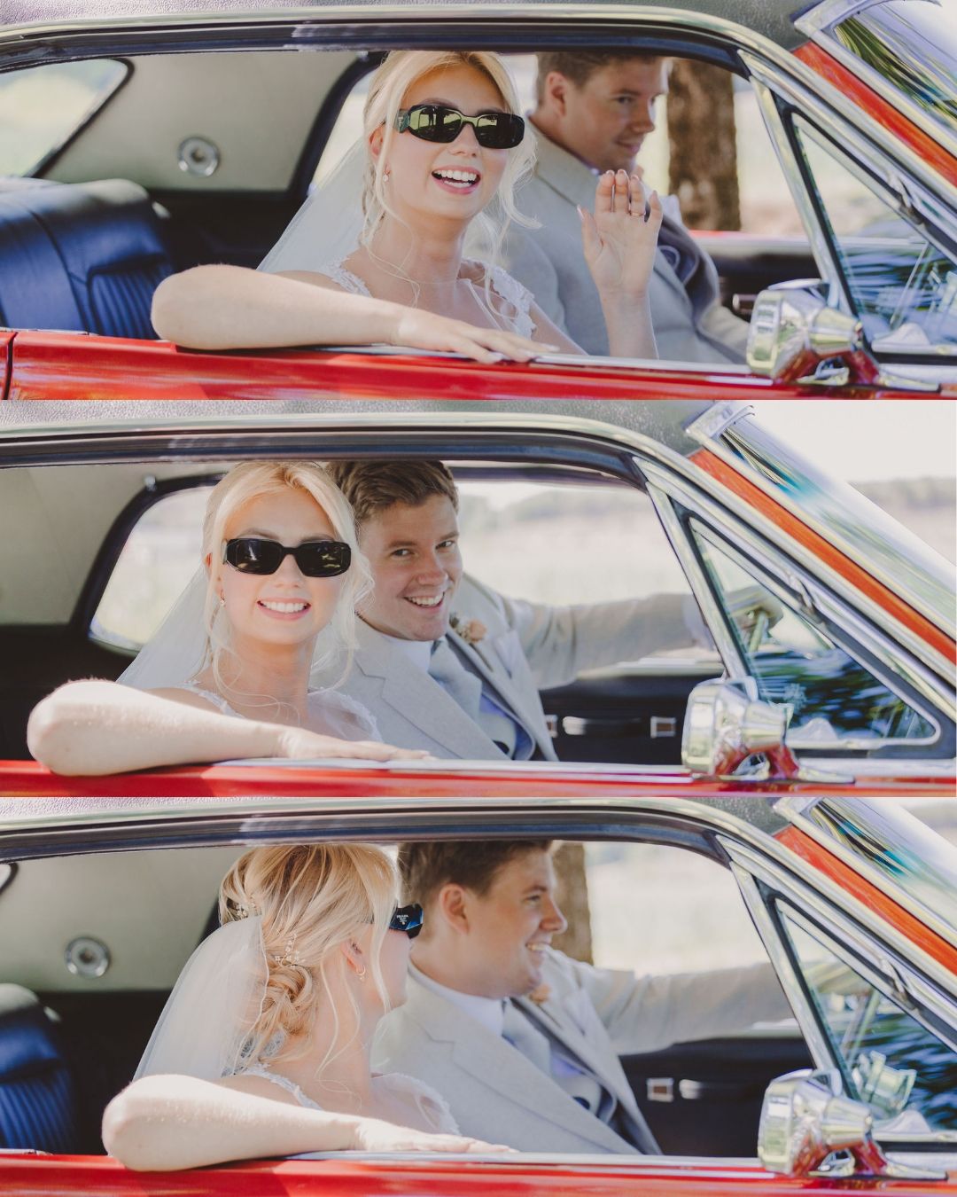 Two people in sunglasses sit in a vintage red car on a bright sunny day.