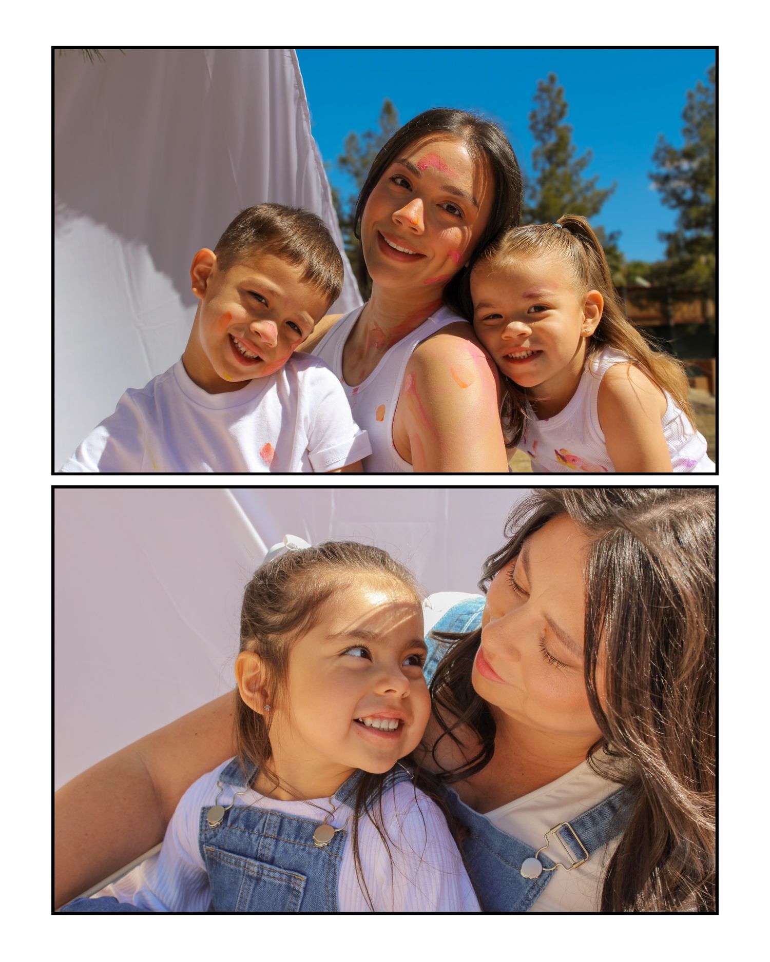 Happy mother posing outdoors with her two young children on a sunny day with blue skies.