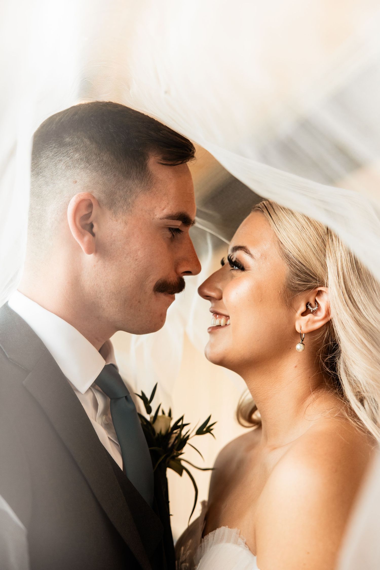 Bride and Groom under the veil
