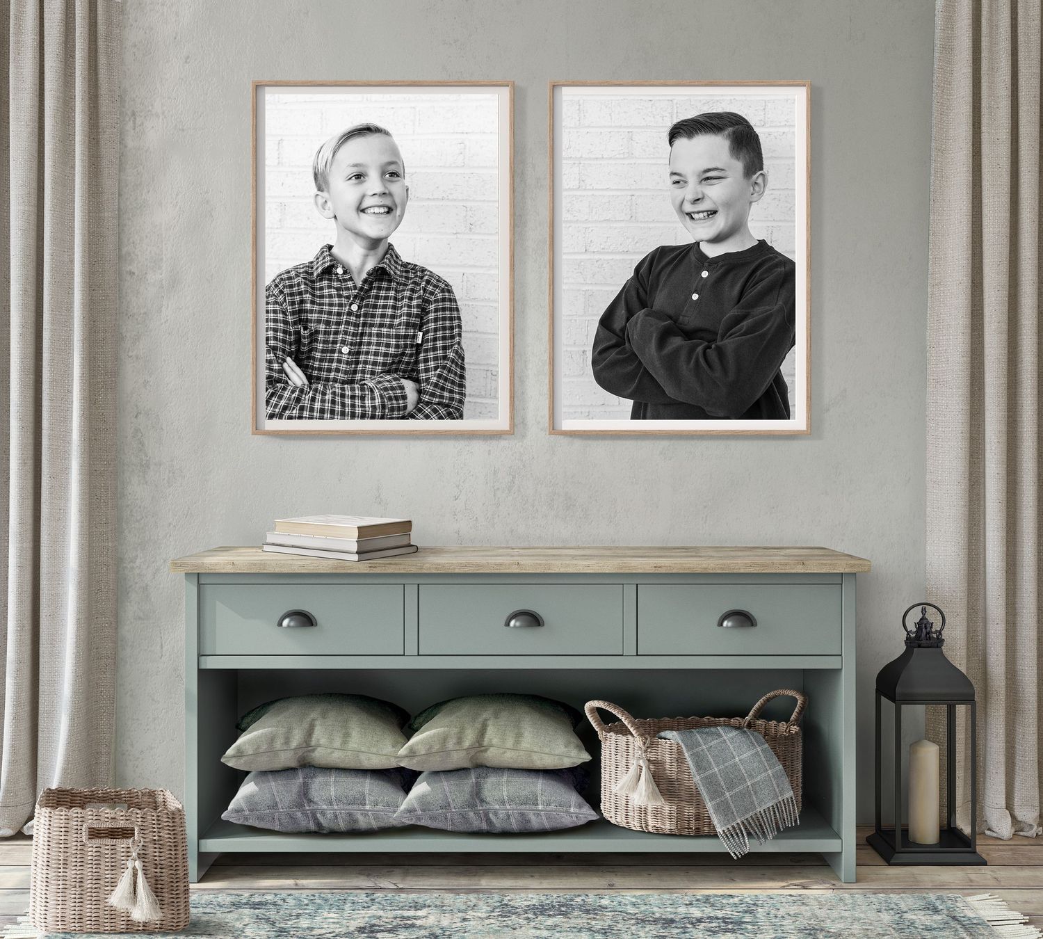 Gallery wall with portraits above a rustic green storage bench with decorative pillows.