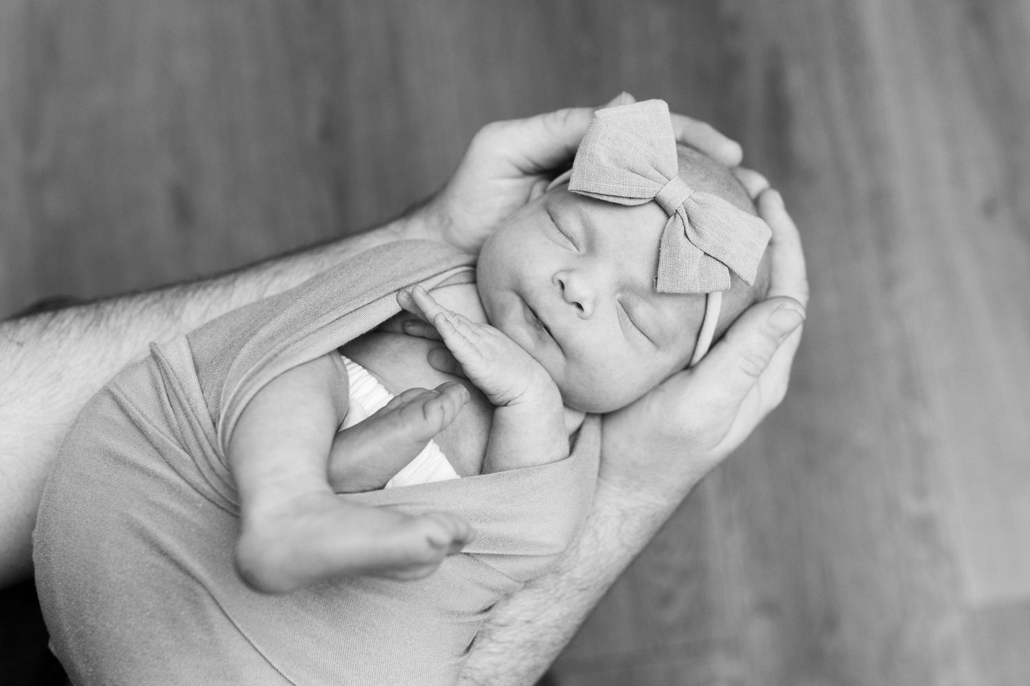 Black and white artistic newborn photography series.