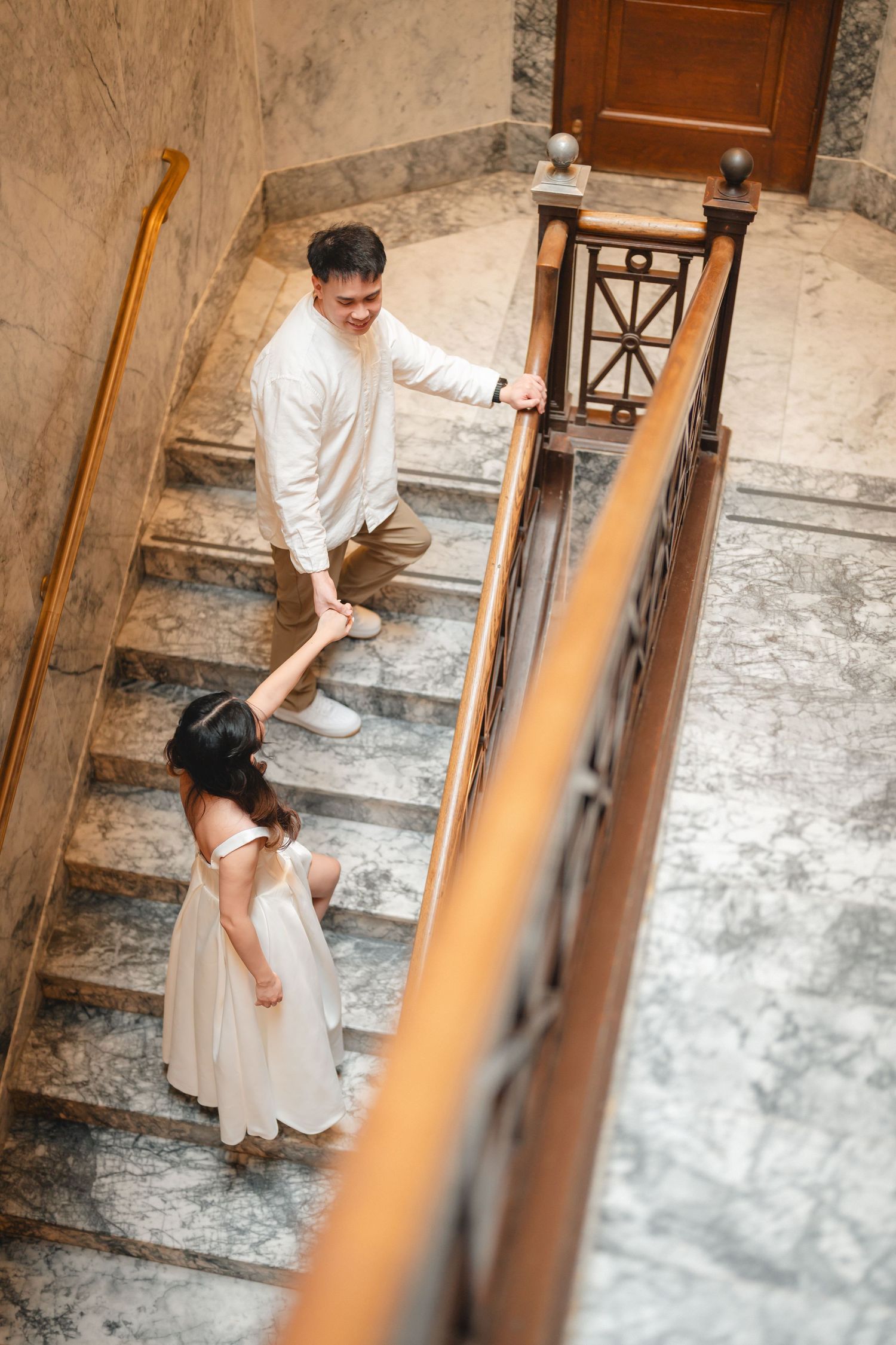 Multiple photos show someone sitting on stone steps in a rustic building interior with dramatic lighting and shadows.