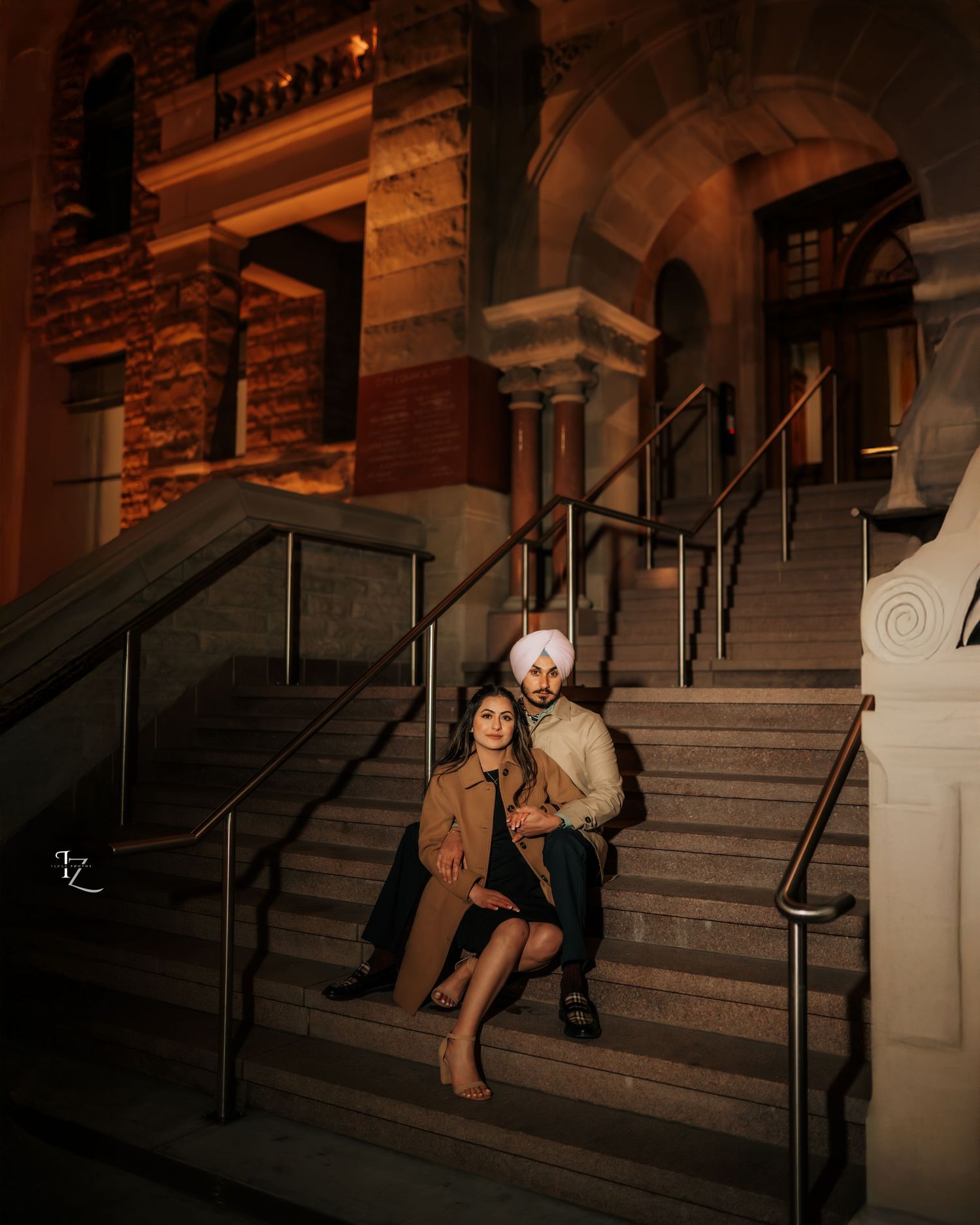 Beautiful aesthetic portrait of Punjabi couple sitting and gazing at each other in ethnic wear in calgary