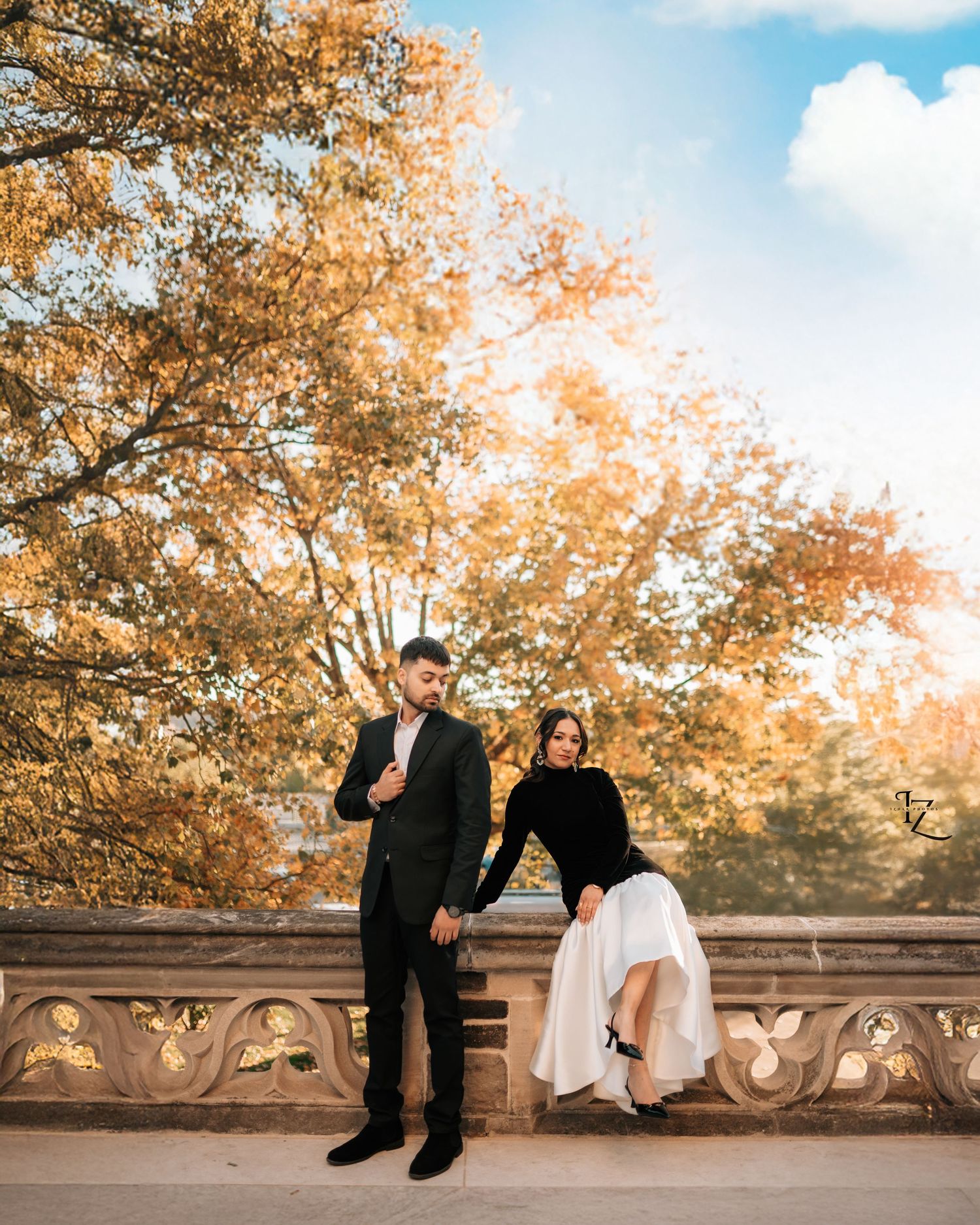 Beautiful Indian couple posing elegantly with vibrant sunset skyline view of Toronto, capturing romantic moments during outdoor engagement p