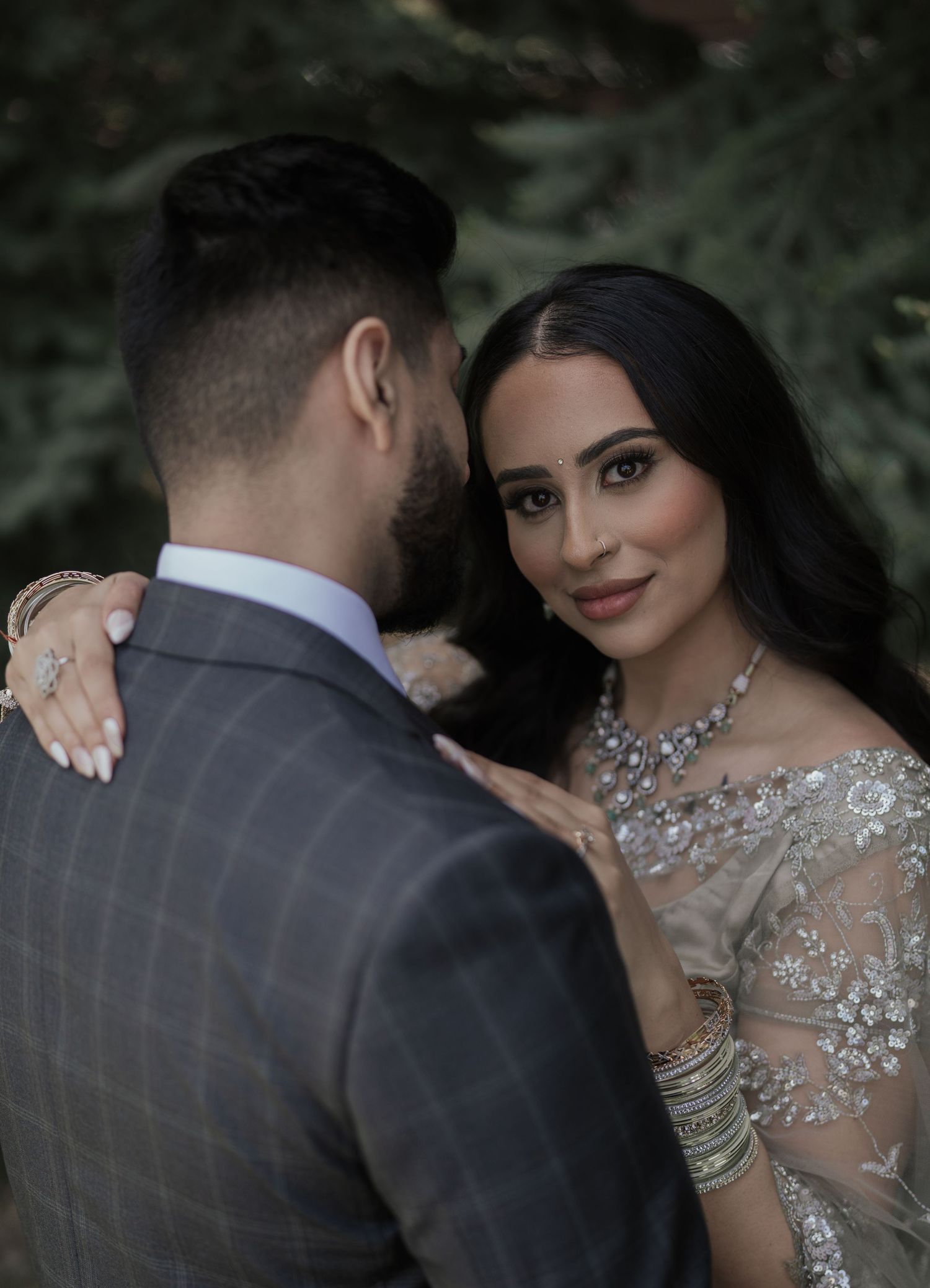 Elegant Indian couple outdoor e-shoot photoshoot capturing romantic moments in vibrant traditional and modern attire