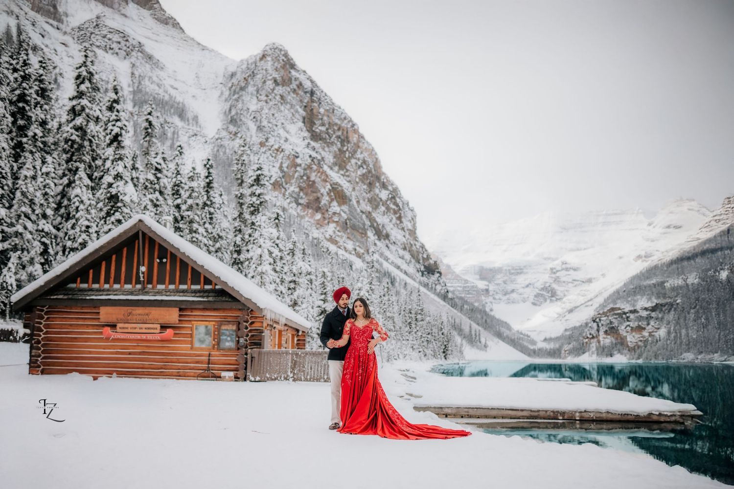 Elegant Indian couple engagement photoshoot in Banff with vibrant traditional clothing and dramatic mountain backdrops