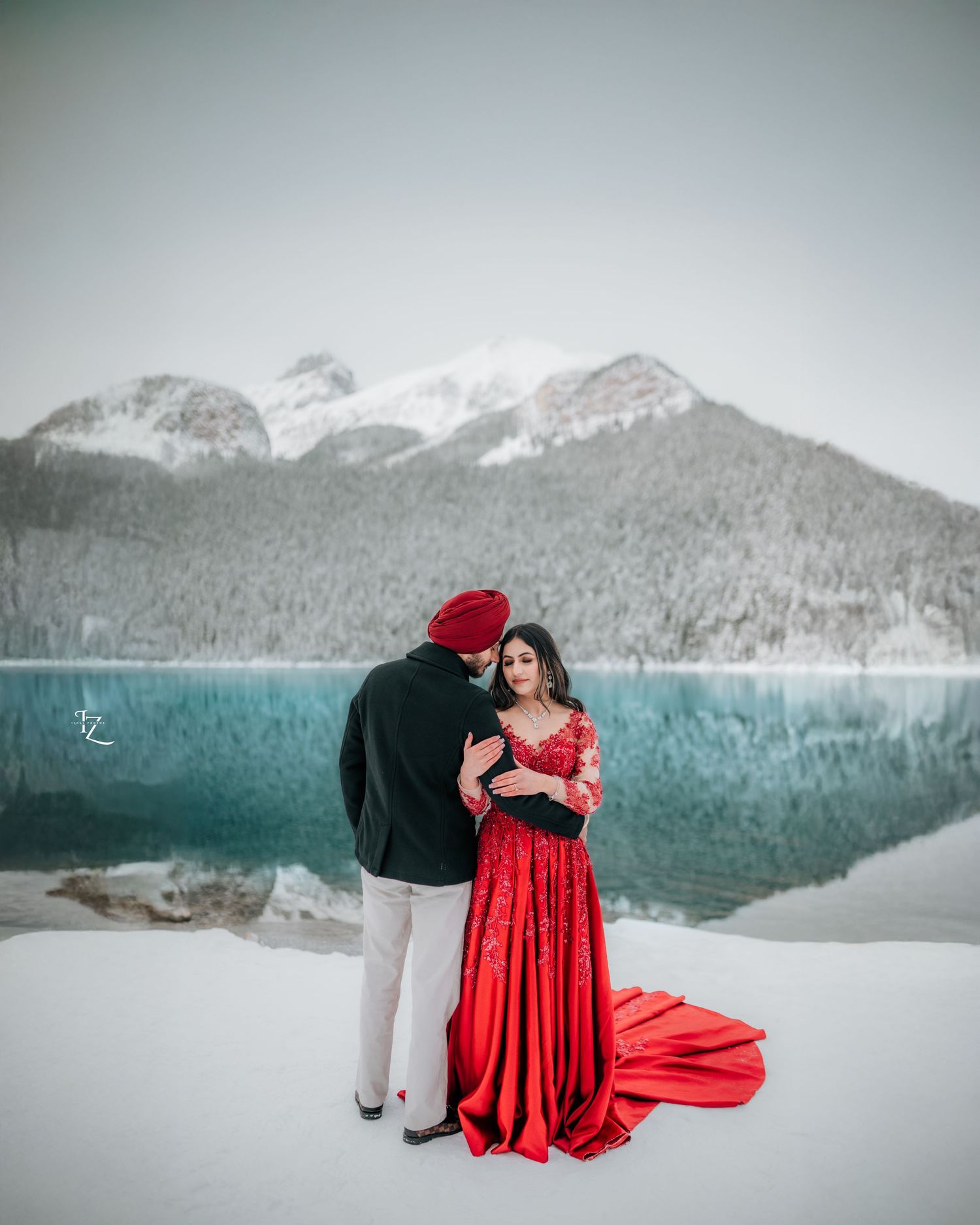Stunning Indian couple photoshoot in Banff National Park, featuring traditional and modern wedding attire, capturing romantic& candid moment