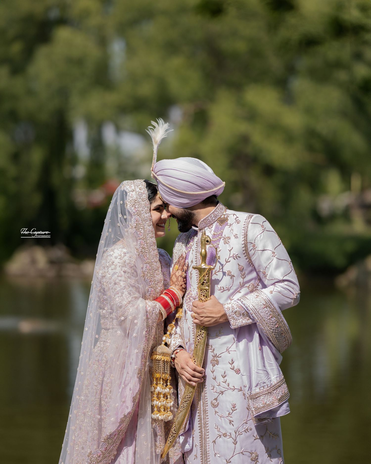 Beautiful Sikh couple photoshoot showcasing traditional attire and romantic poses during outdoor engagement session
