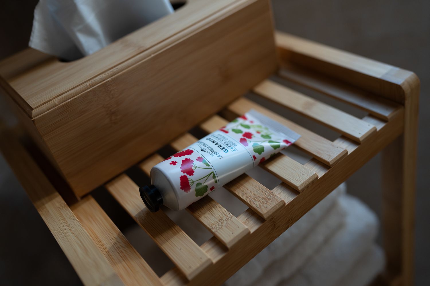 Wooden slatted bed frame detail showing natural materials and craftsmanship.