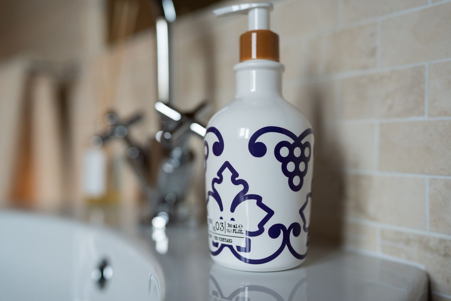 Decorative ceramic bathroom fixtures with blue and white patterns.