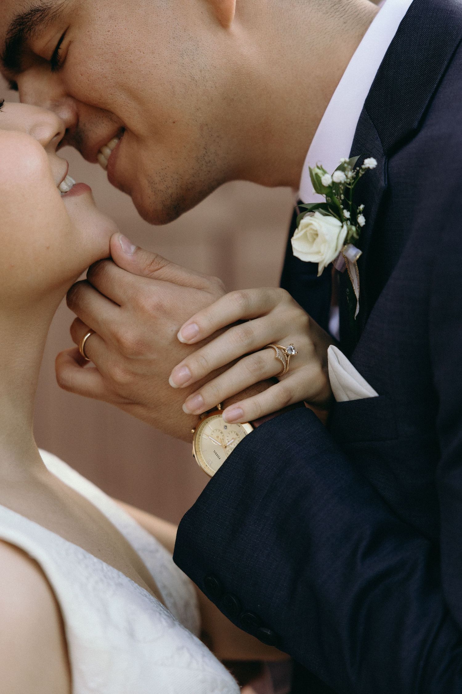 Close-up shots of tender romantic moments between bride and groom on their wedding day.
