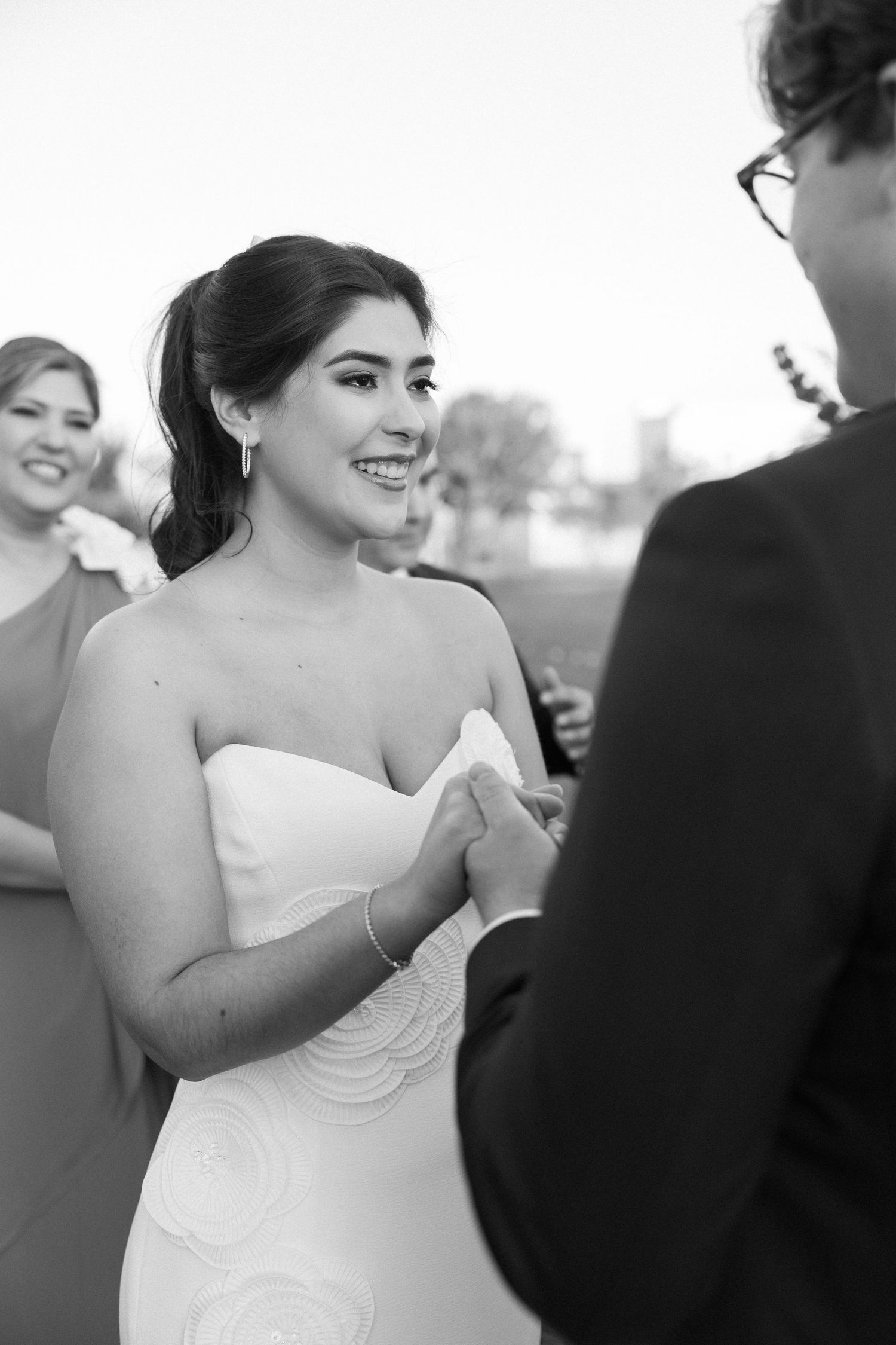 Wedding ceremony candid moments captured in black and white photography.