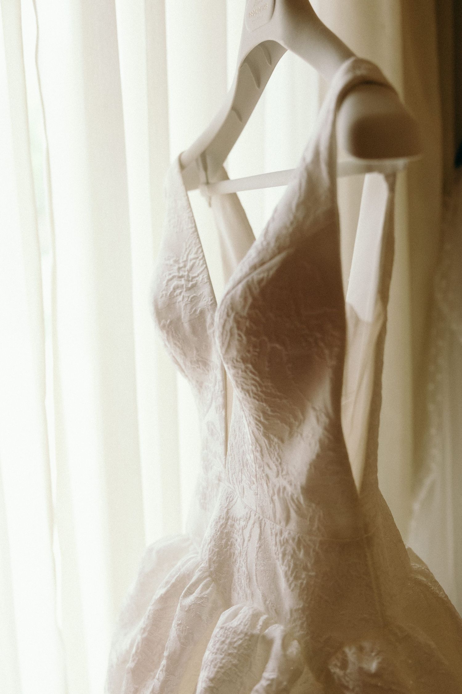 White wedding dress details shown in sequence against light background.