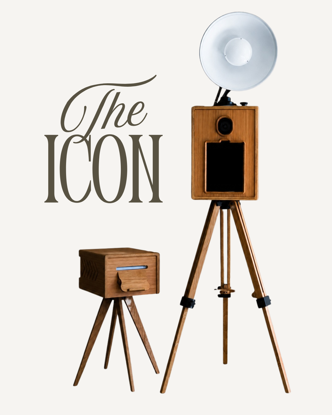 Vintage wooden photo booth on tripod with flash lamp and separate printer stand, labeled The Icon.